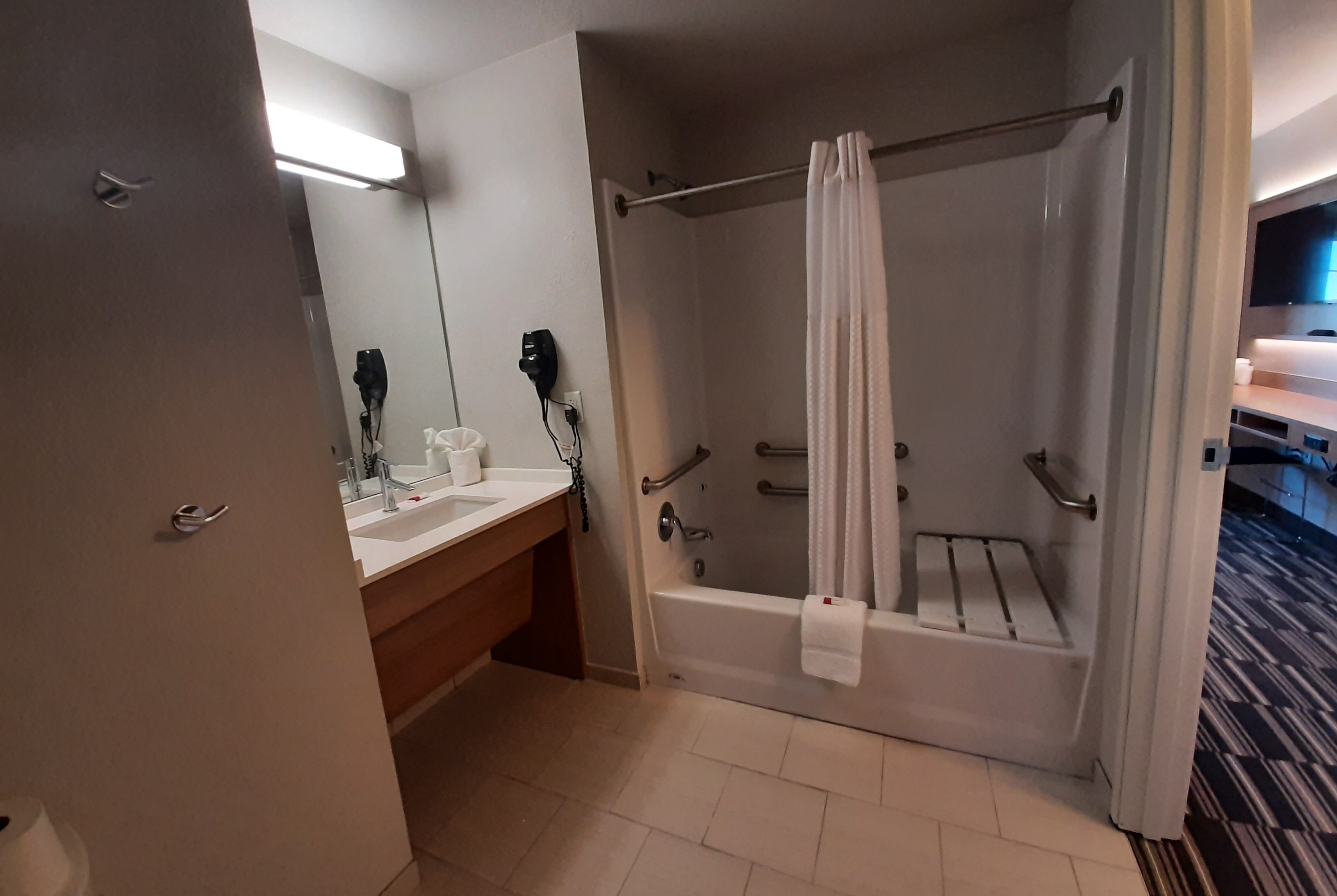 Guest room bath at the Microtel Inn & Suites by Wyndham Loveland in Loveland, Colorado