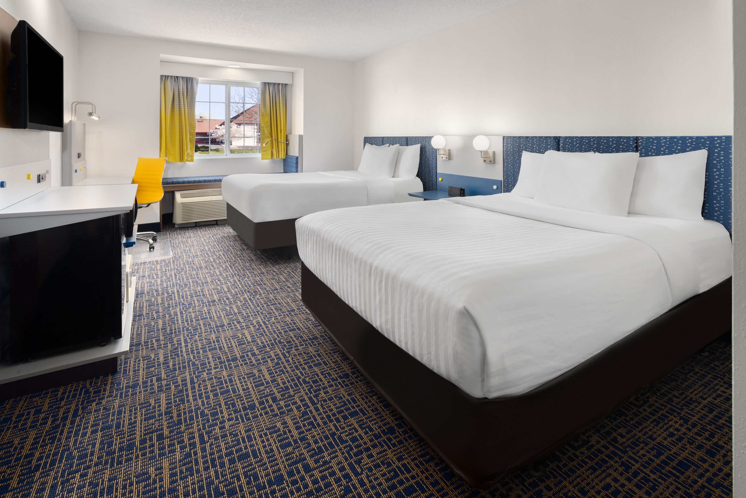 Guest room at the Microtel Inn & Suites by Wyndham Dover in Dover, Delaware