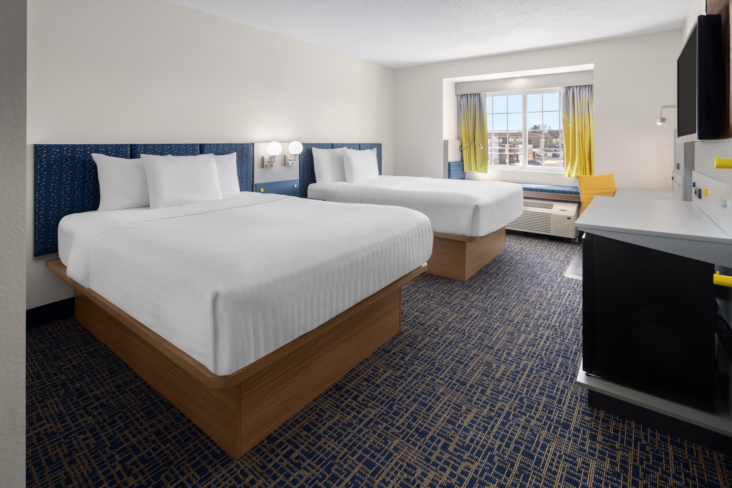 Guest room at the Microtel Inn & Suites by Wyndham Dover in Dover, Delaware
