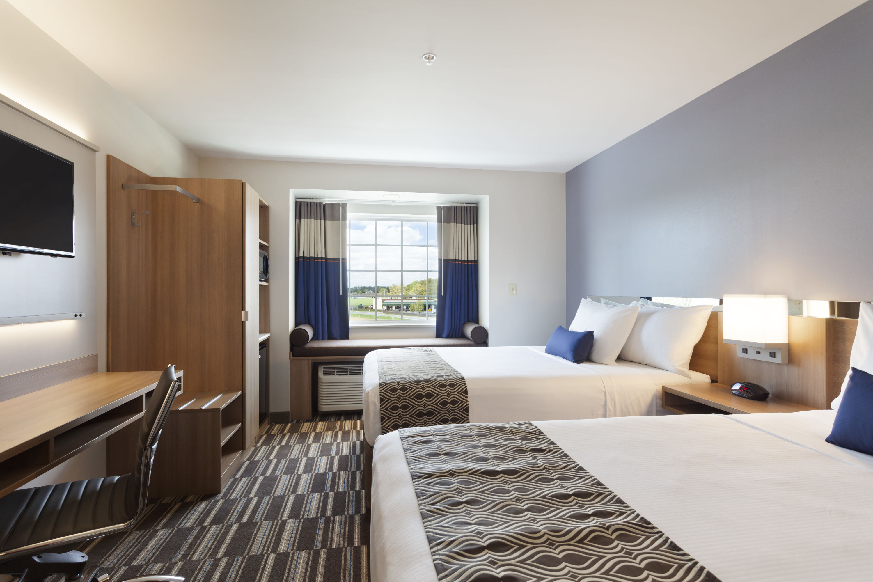 Guest room at the Microtel Inn & Suites by Wyndham Georgetown Delaware Beaches in Georgetown, Delaware