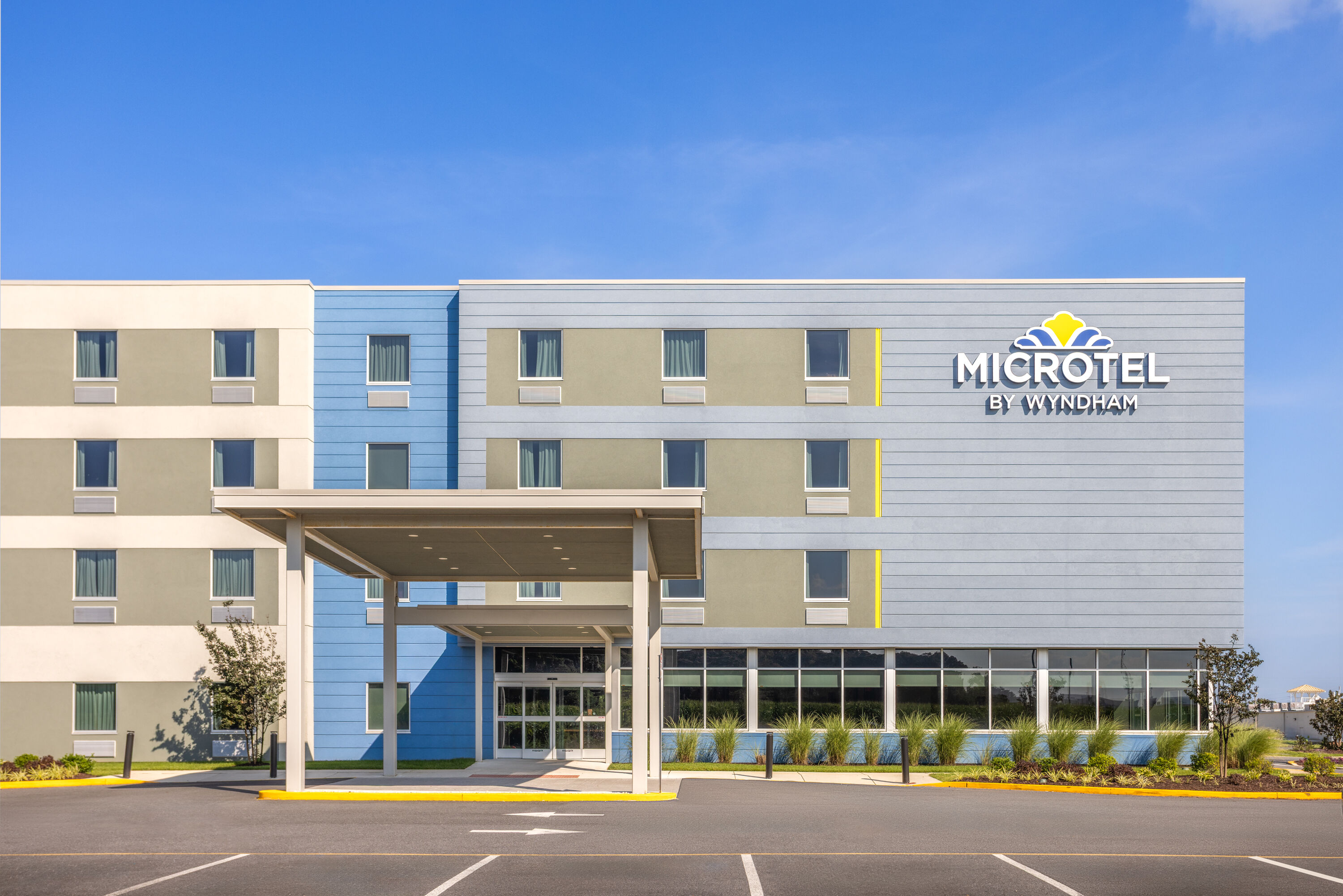 Exterior Day Image of Microtel Inn & Suites by Wyndham Rehoboth Beach hotel in Rehoboth Beach, Delaware