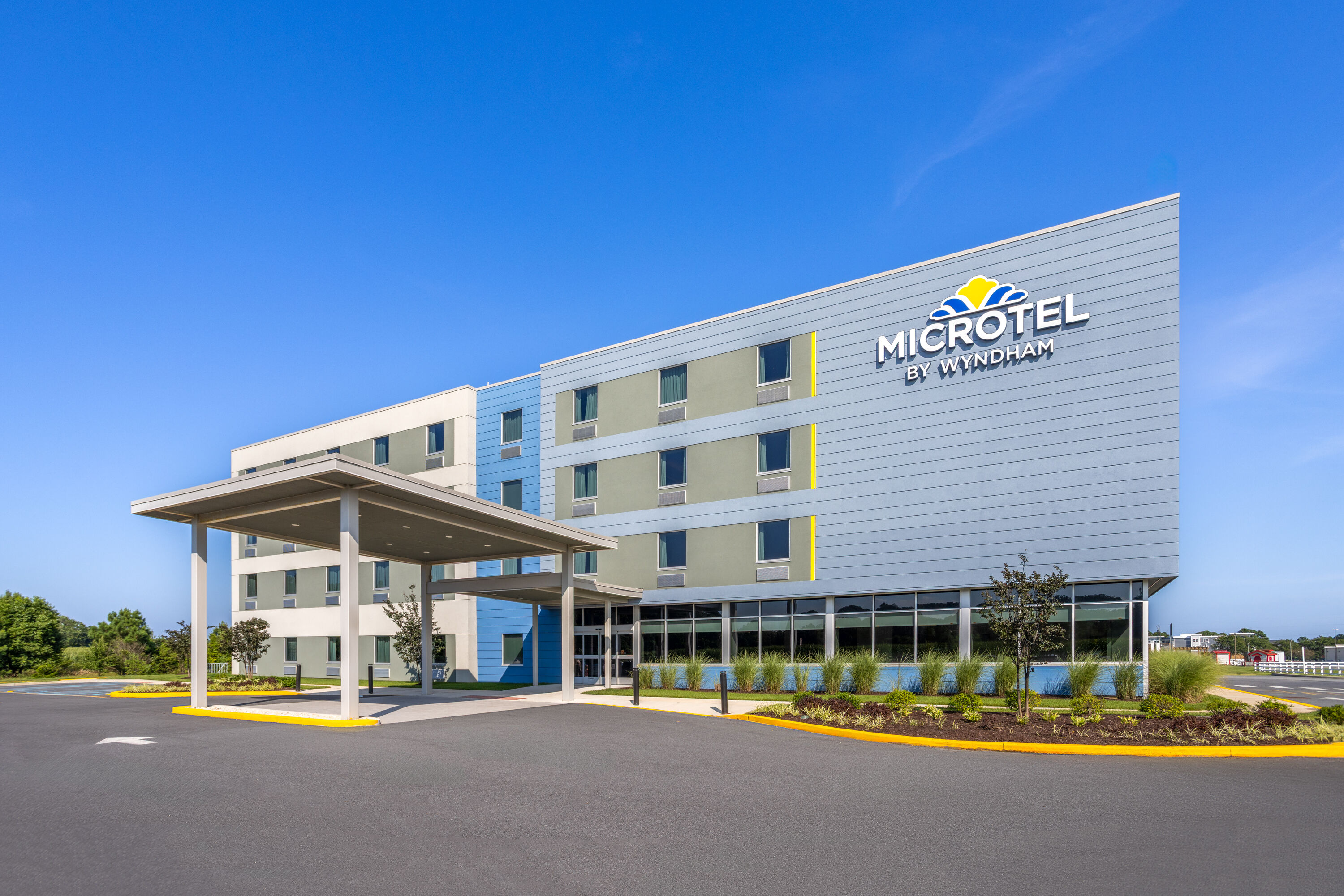 Exterior Day Image of Microtel Inn & Suites by Wyndham Rehoboth Beach hotel in Rehoboth Beach, Delaware