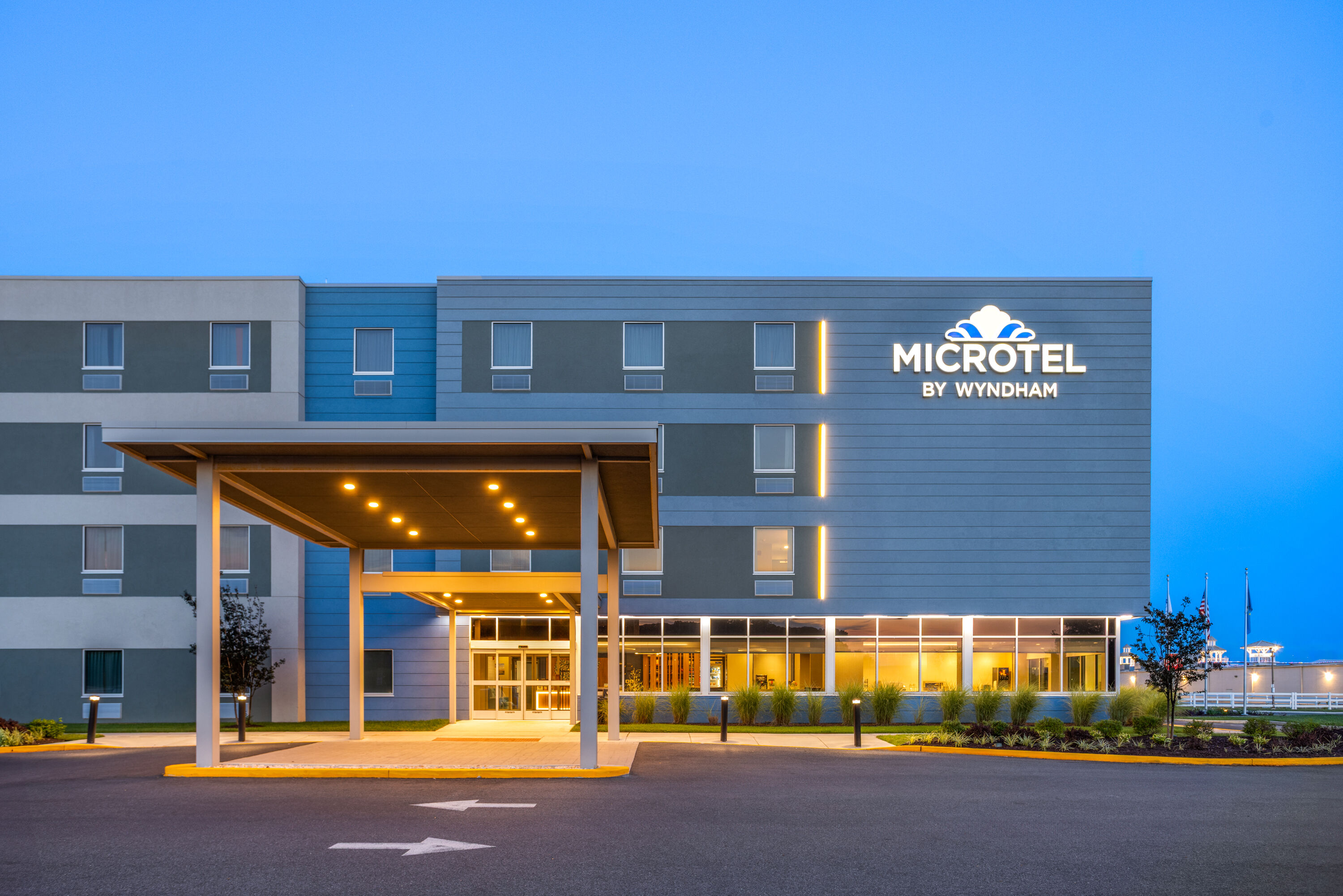 Exterior Dusk Image of Microtel Inn & Suites by Wyndham Rehoboth Beach hotel in Rehoboth Beach, Delaware