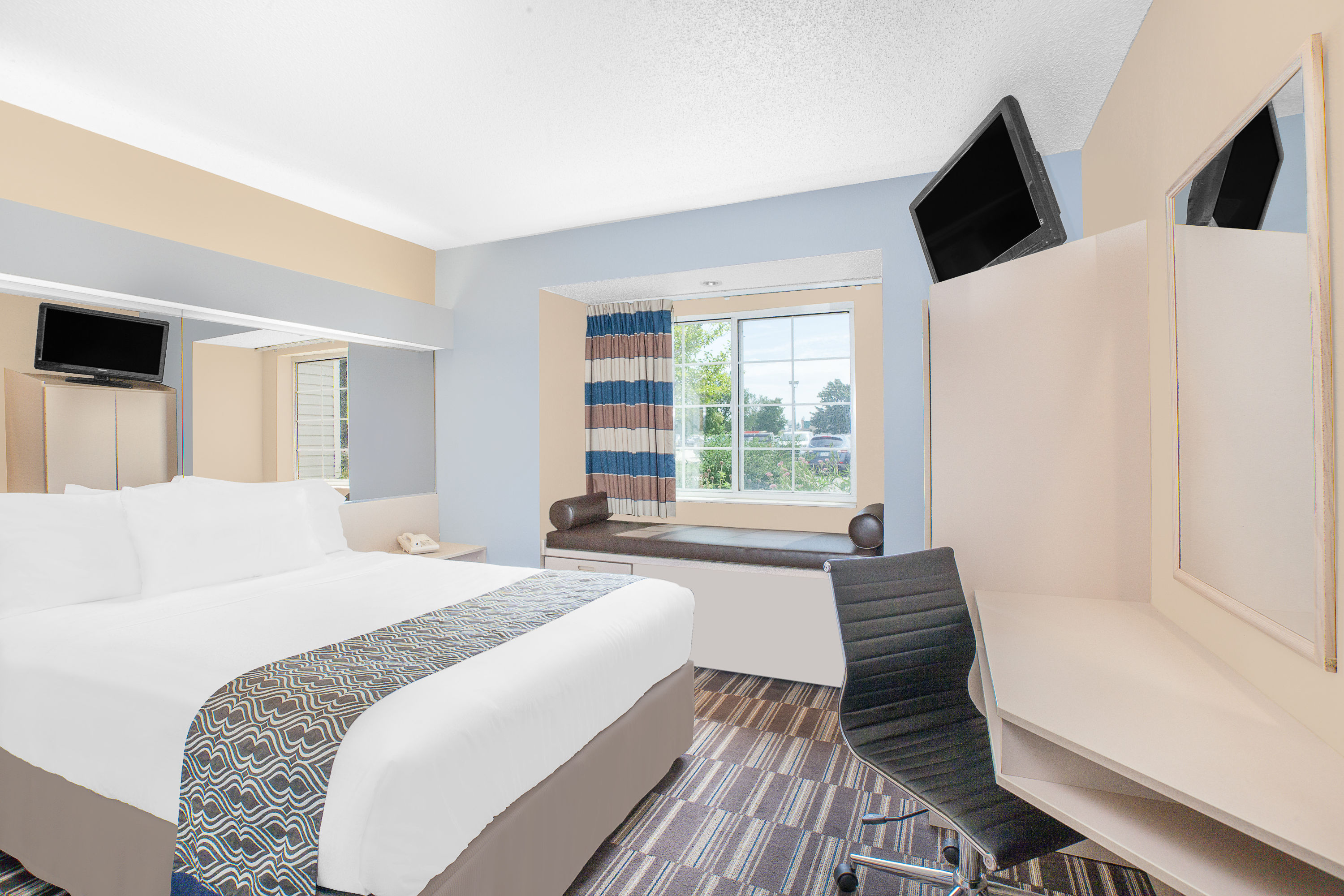 Guest room at the Microtel Inn & Suites by Wyndham Clear Lake in Clear Lake, Iowa