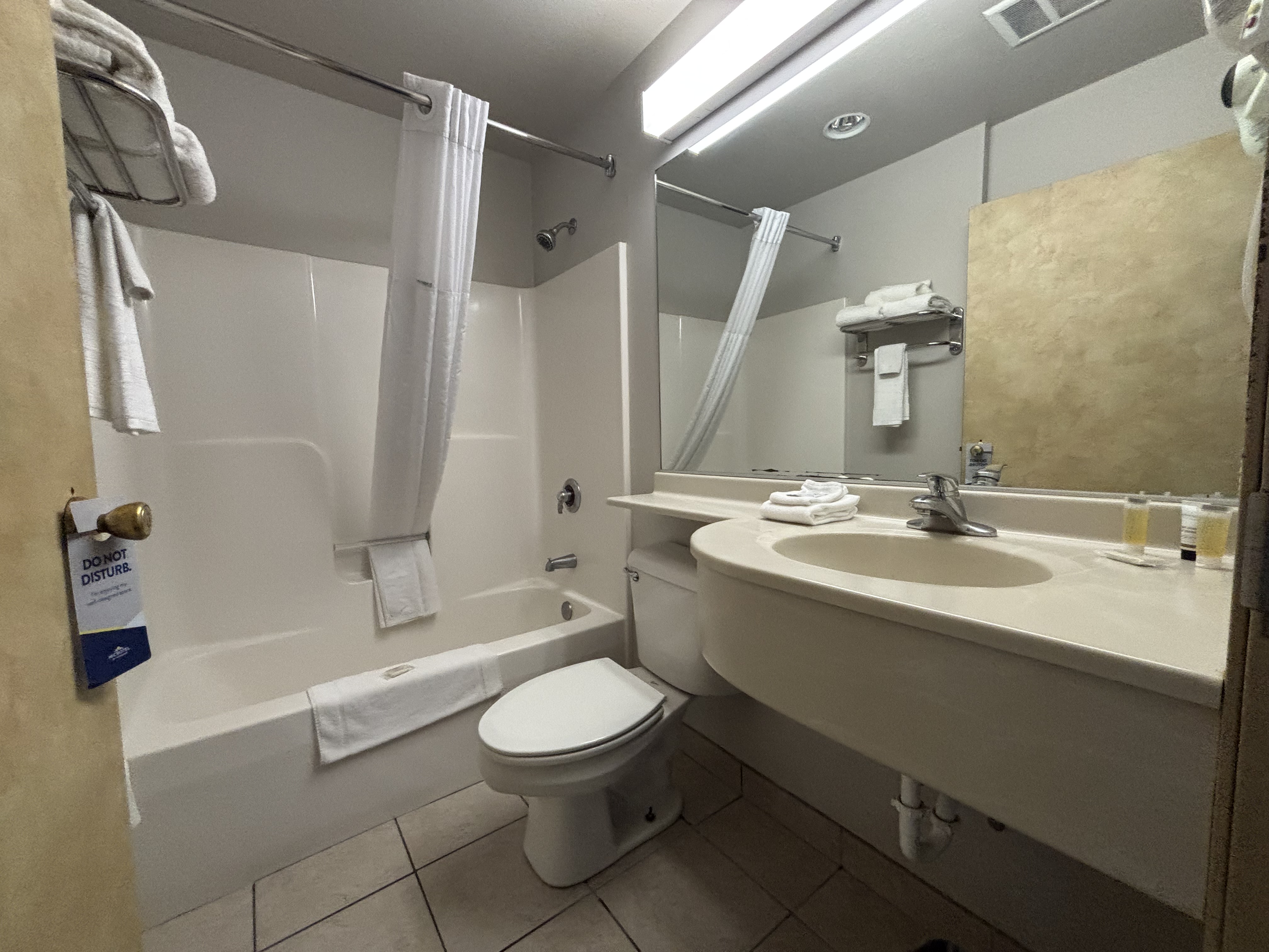 Guest room bath at the Microtel Inn & Suites by Wyndham Quincy Downtown/River Area in Quincy, Illinois