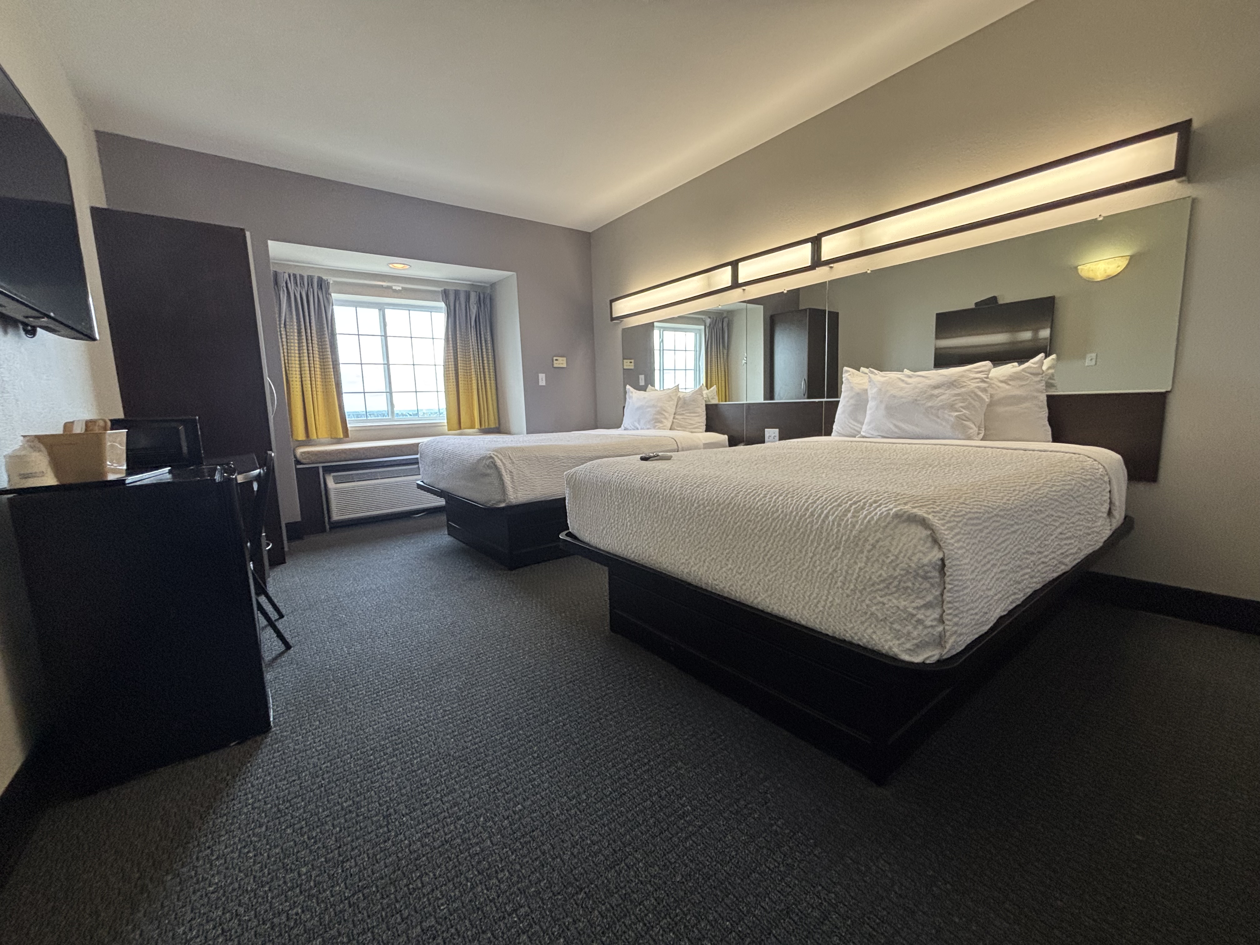 King bed guest room at the Microtel Inn & Suites by Wyndham Quincy Downtown/River Area in Quincy, Illinois