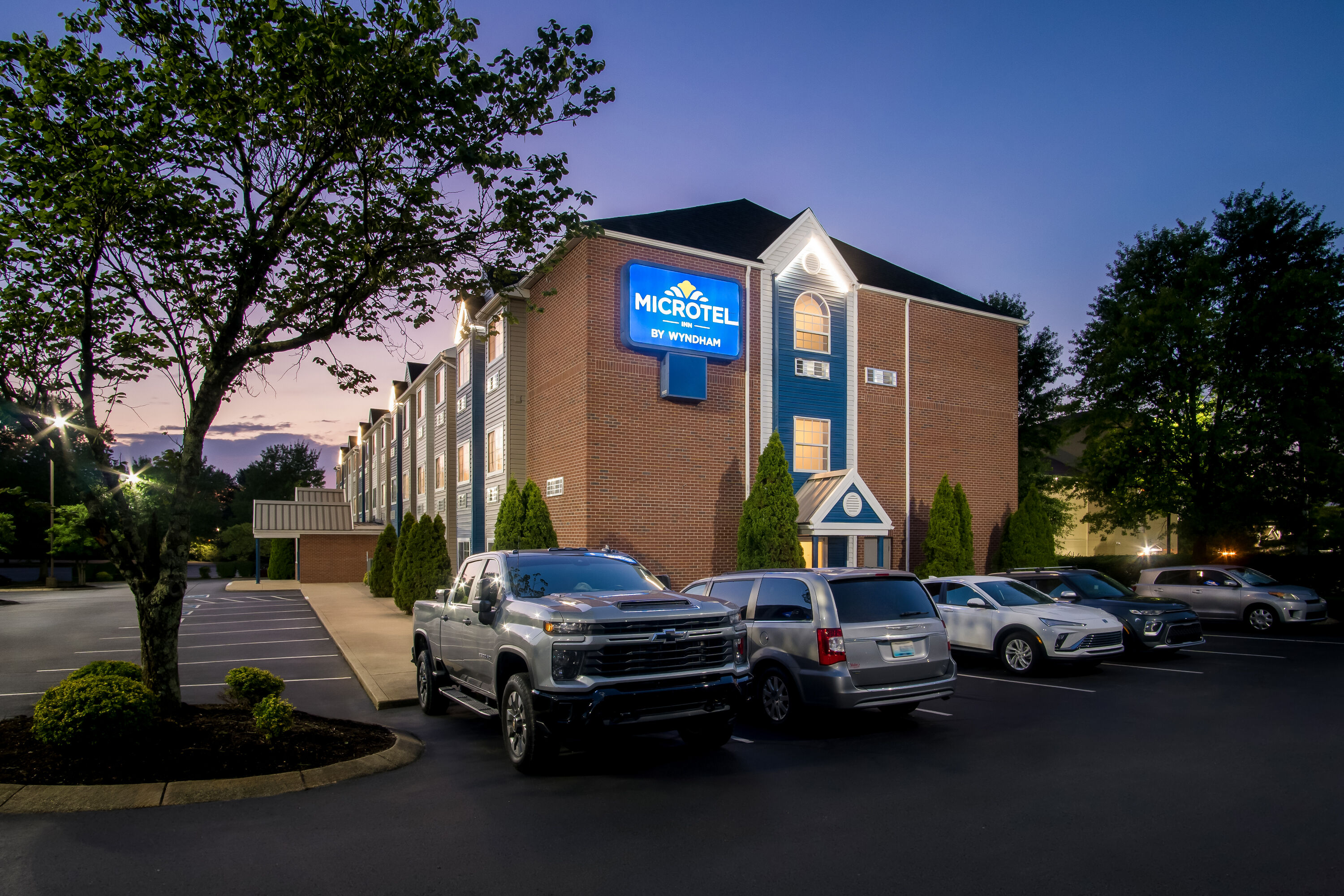 Exterior Night Image of Microtel Inn & Suites by Wyndham Georgetown hotel in Georgetown, Kentucky