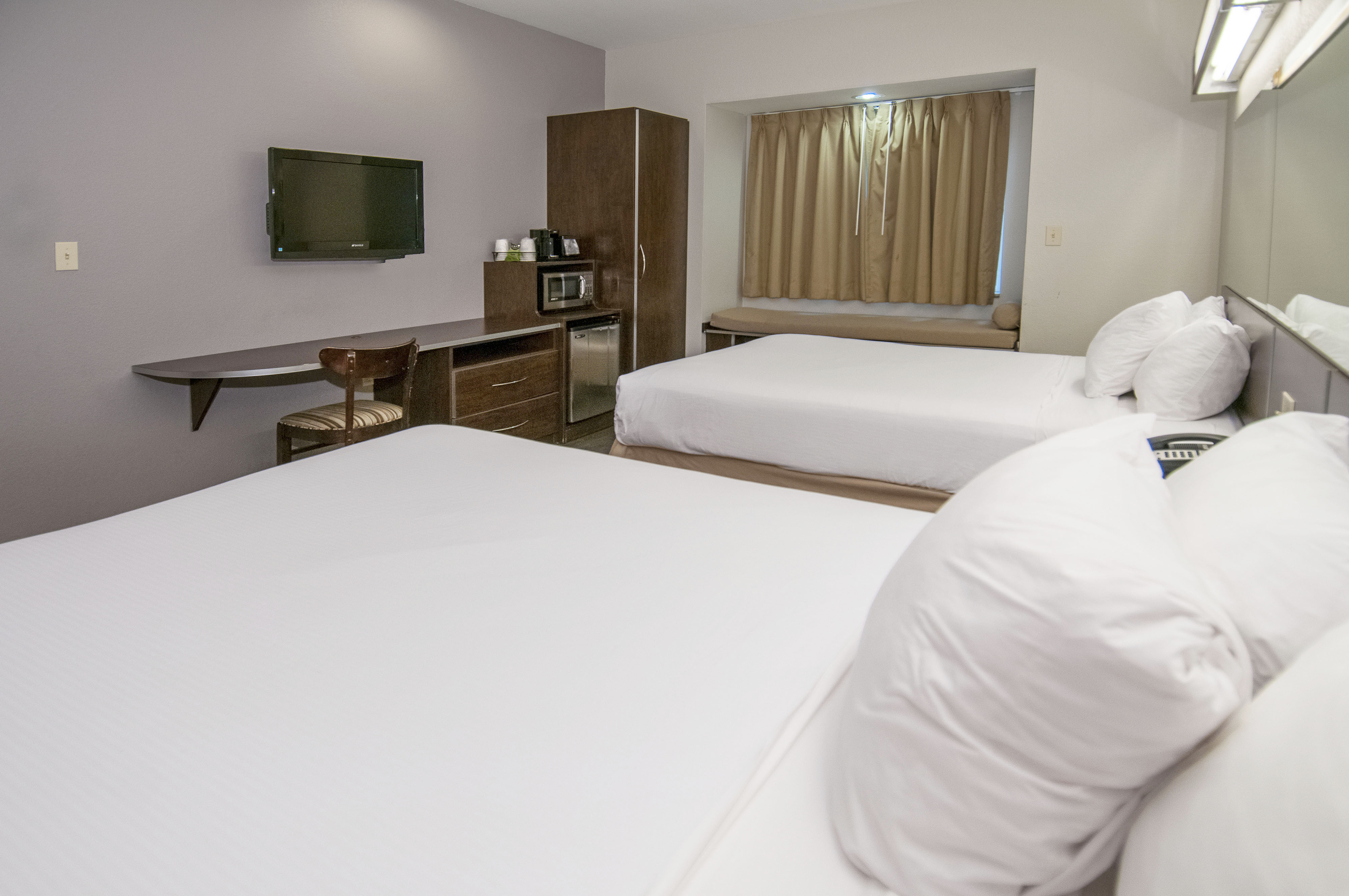 Guest room at the Microtel Inn & Suites by Wyndham Pearl River/Slidell in Pearl River, Louisiana