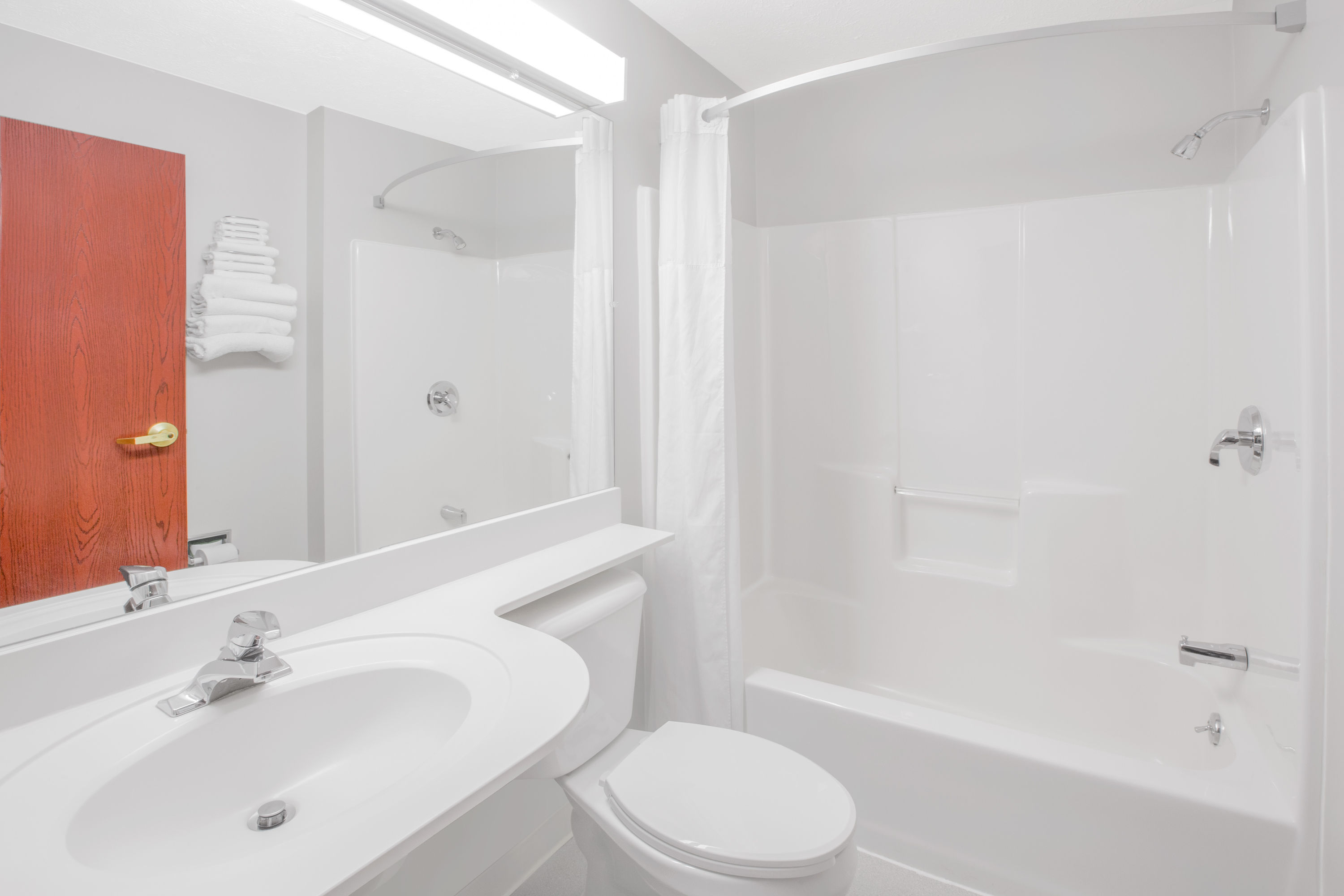 Guest room bath at the Microtel Inn & Suites by Wyndham Manistee in Manistee, Michigan