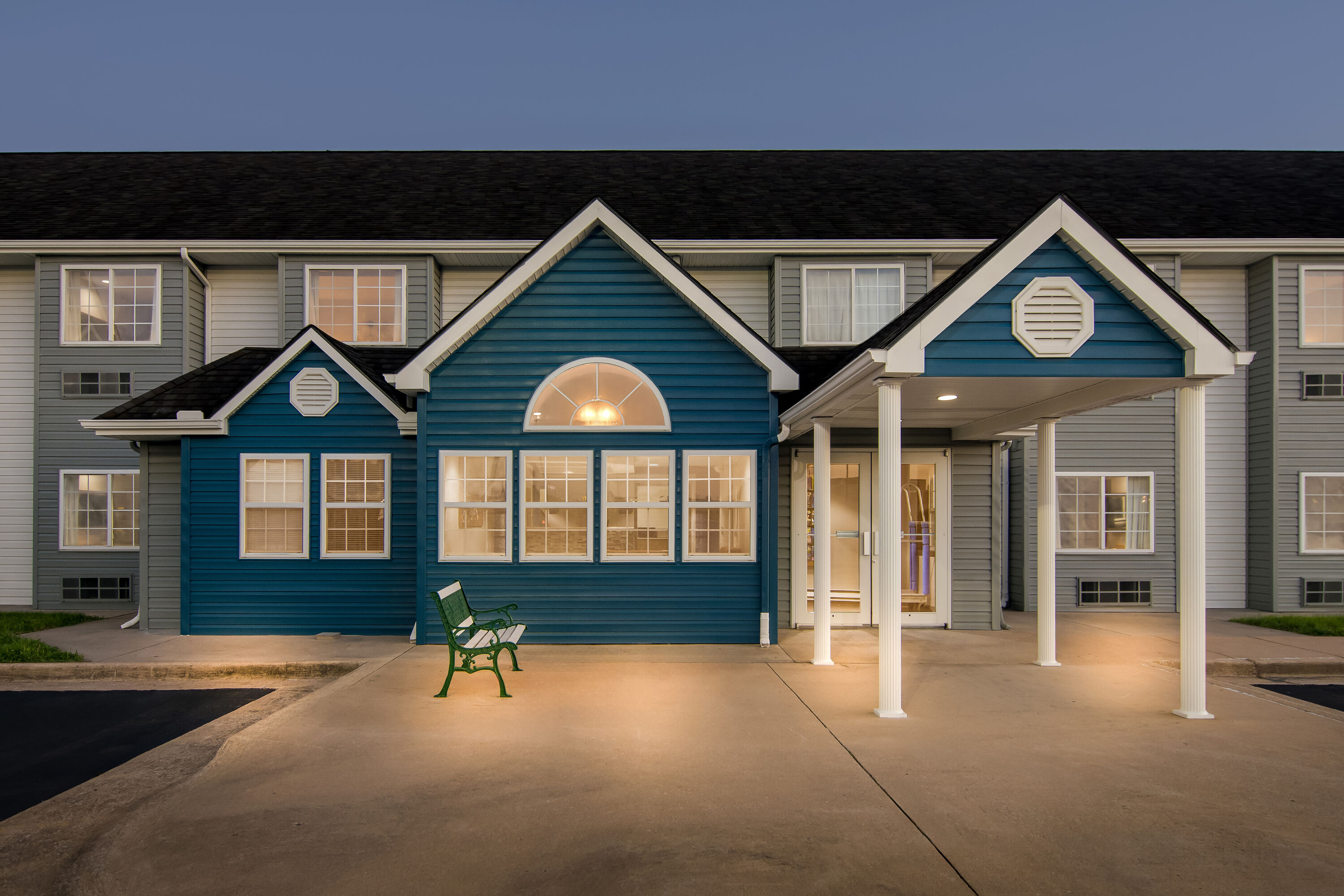 Exterior Night Image of Microtel Inn & Suites by Wyndham Joplin hotel in Joplin, Missouri