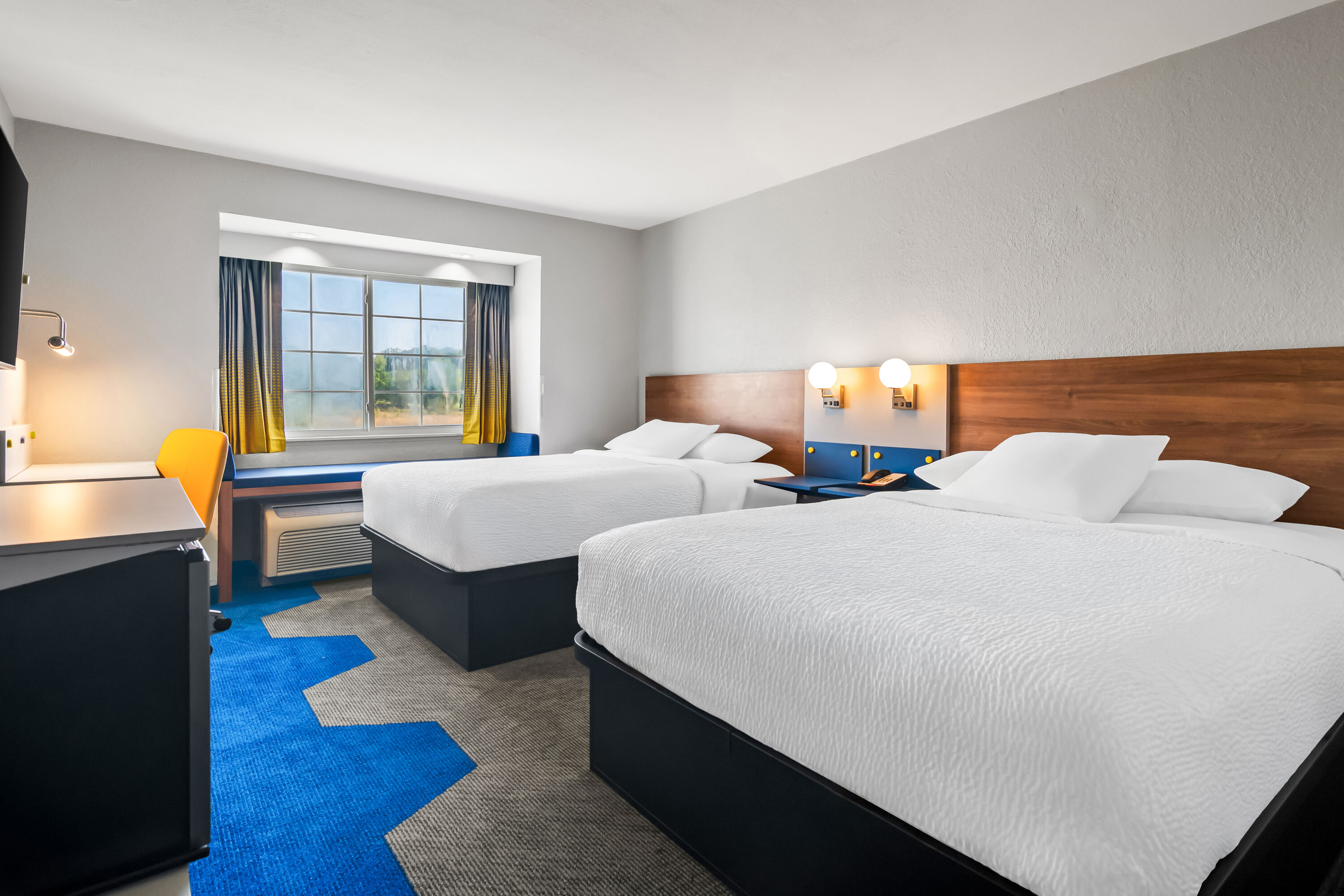 Double bed guest room at the Microtel Inn & Suites by Wyndham Joplin in Joplin, Missouri