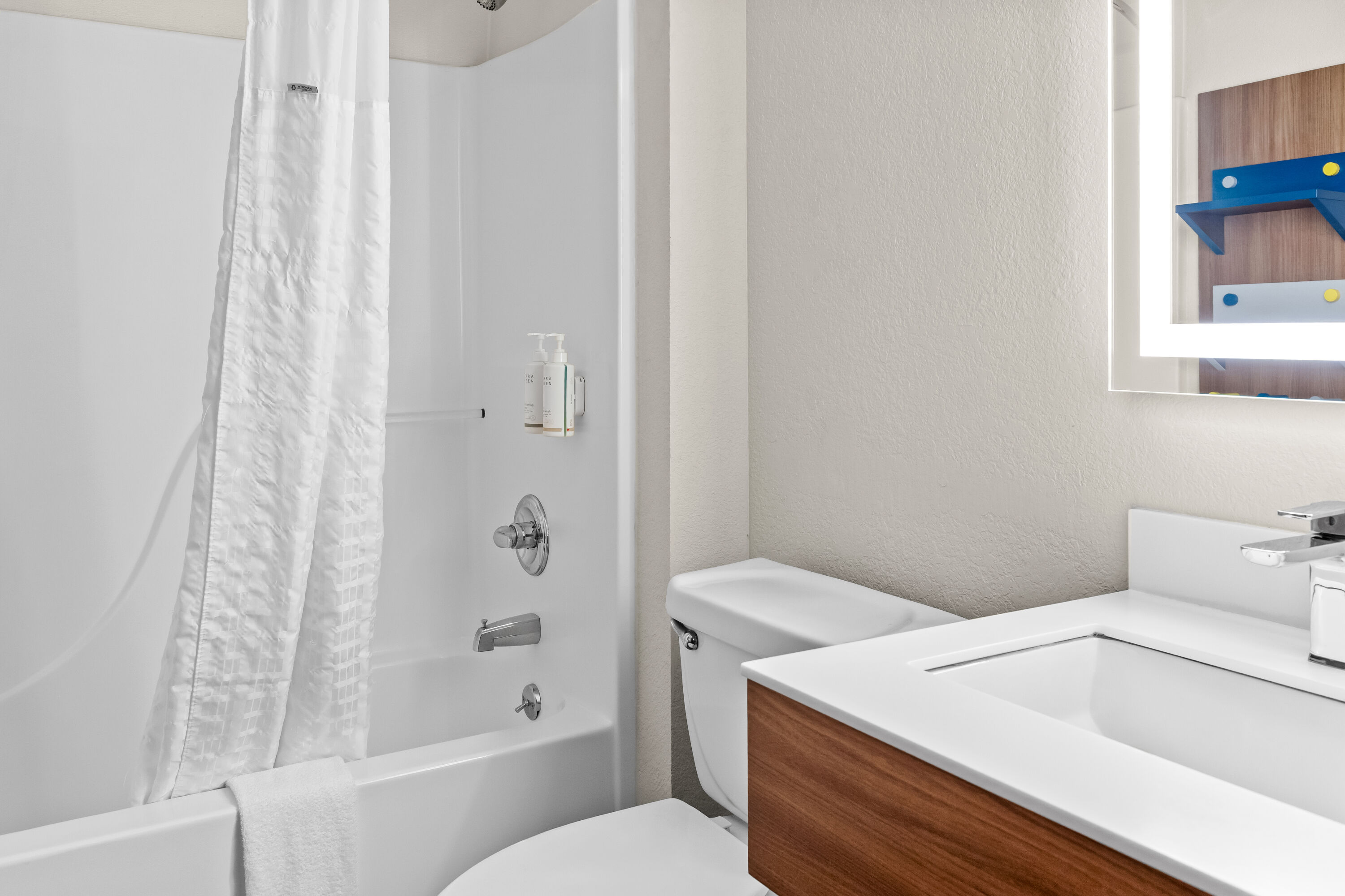 Guest room bath at the Microtel Inn & Suites by Wyndham Sainte Genevieve in Sainte Genevieve, Missouri