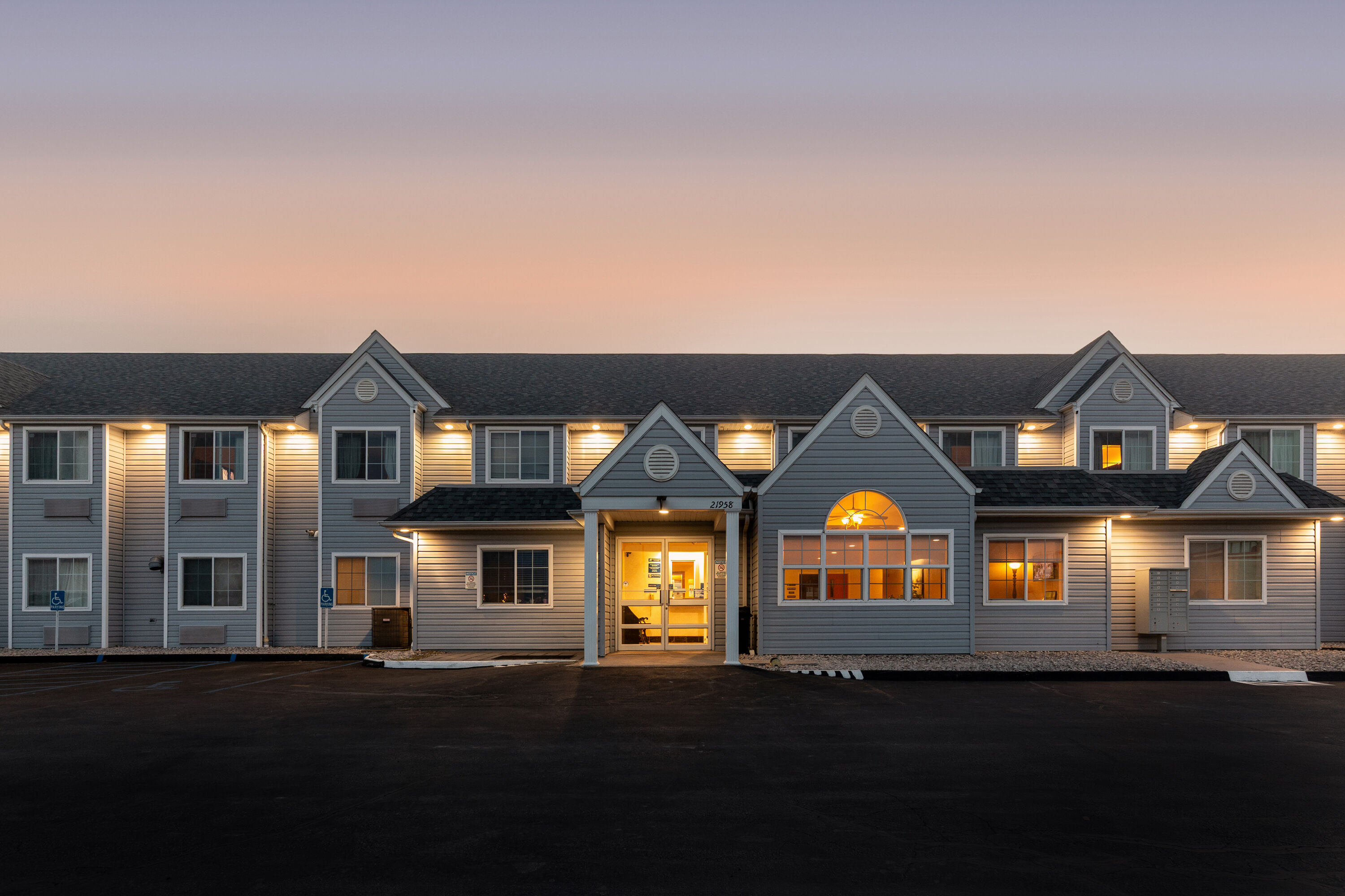 Exterior Night Image of Microtel Inn & Suites by Wyndham Sainte Genevieve hotel in Sainte Genevieve, Missouri