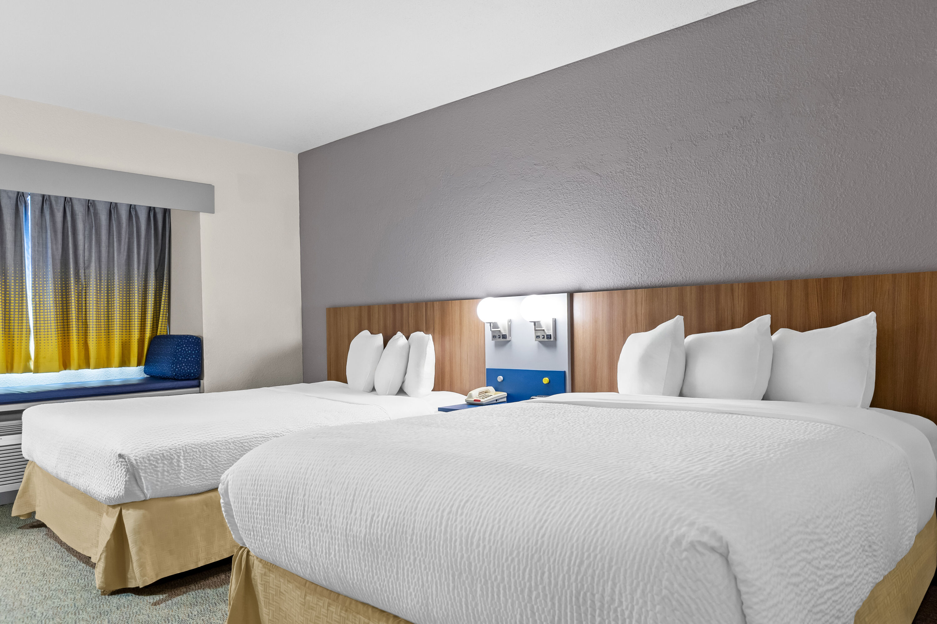 Double bed guest room at the Microtel Inn & Suites by Wyndham Sainte Genevieve in Sainte Genevieve, Missouri