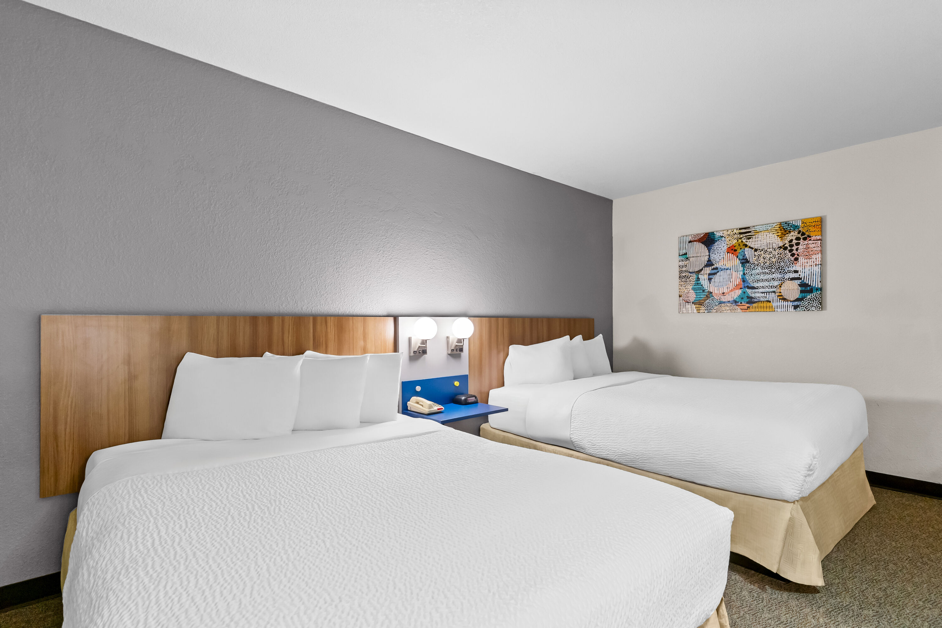 Double bed guest room at the Microtel Inn & Suites by Wyndham Sainte Genevieve in Sainte Genevieve, Missouri