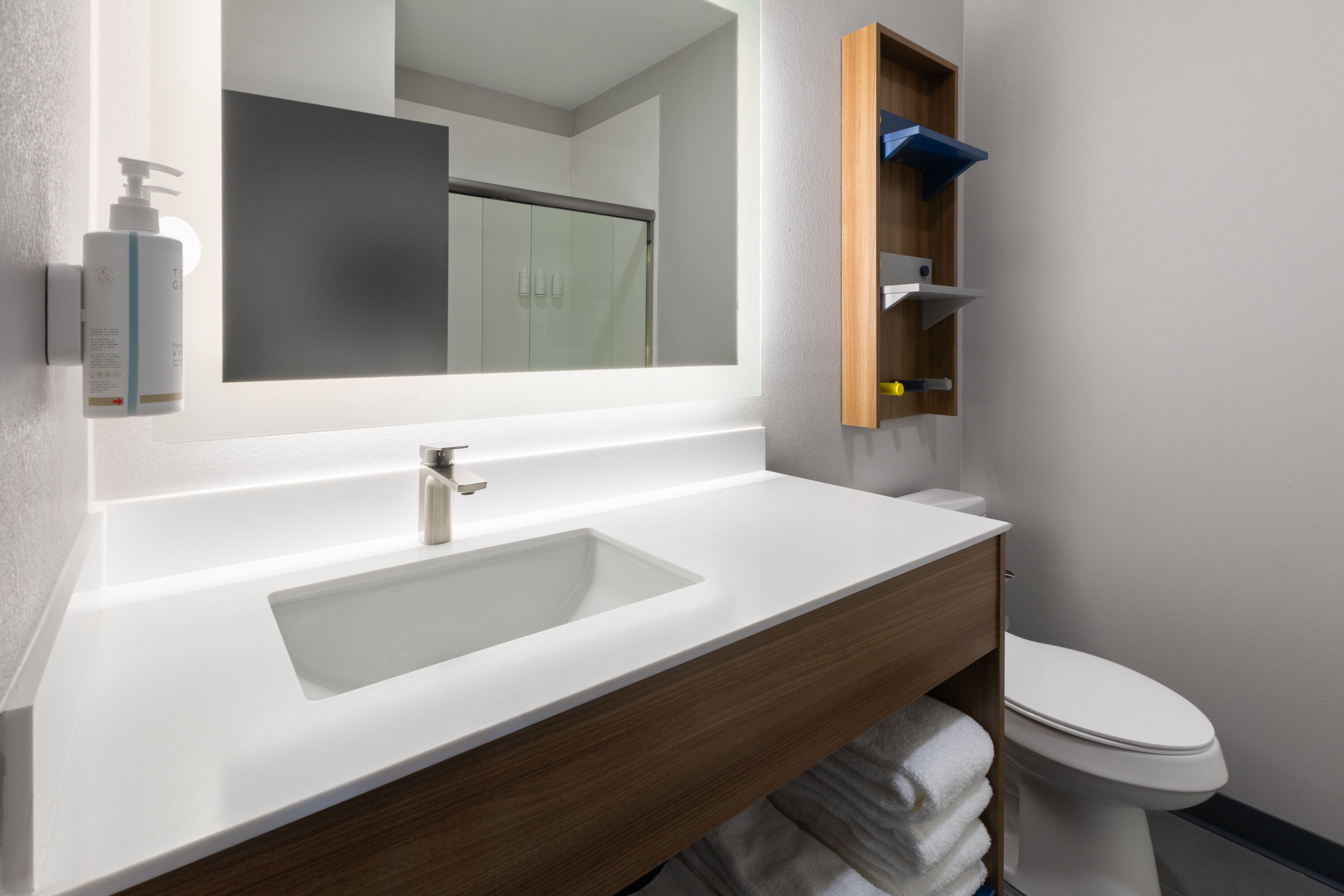 Guest room bath at the Microtel Inn & Suites by Wyndham Olive Branch in Olive Branch, Mississippi