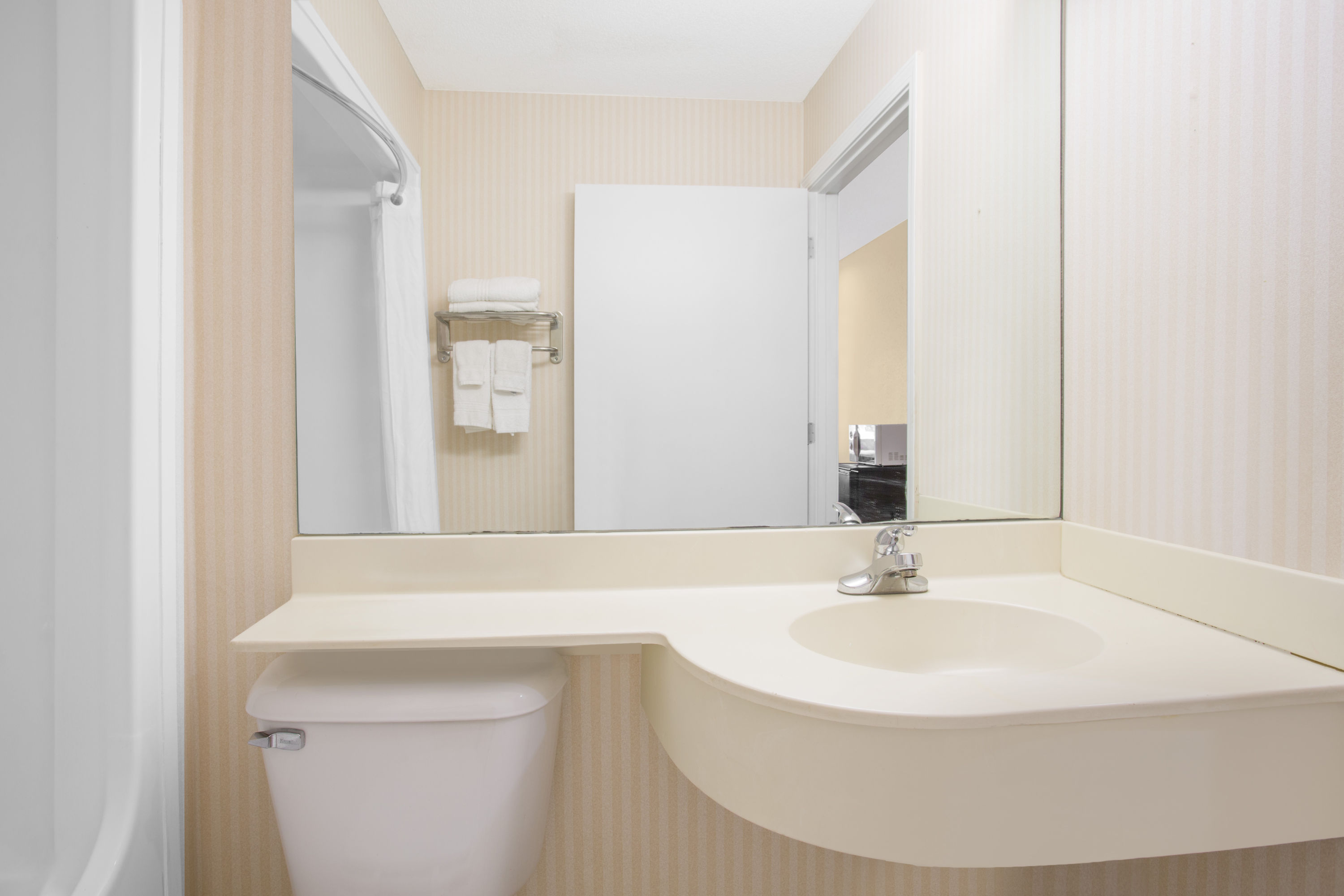Guest room bath at the Microtel Inn & Suites by Wyndham Kannapolis/Concord in Kannapolis, North Carolina
