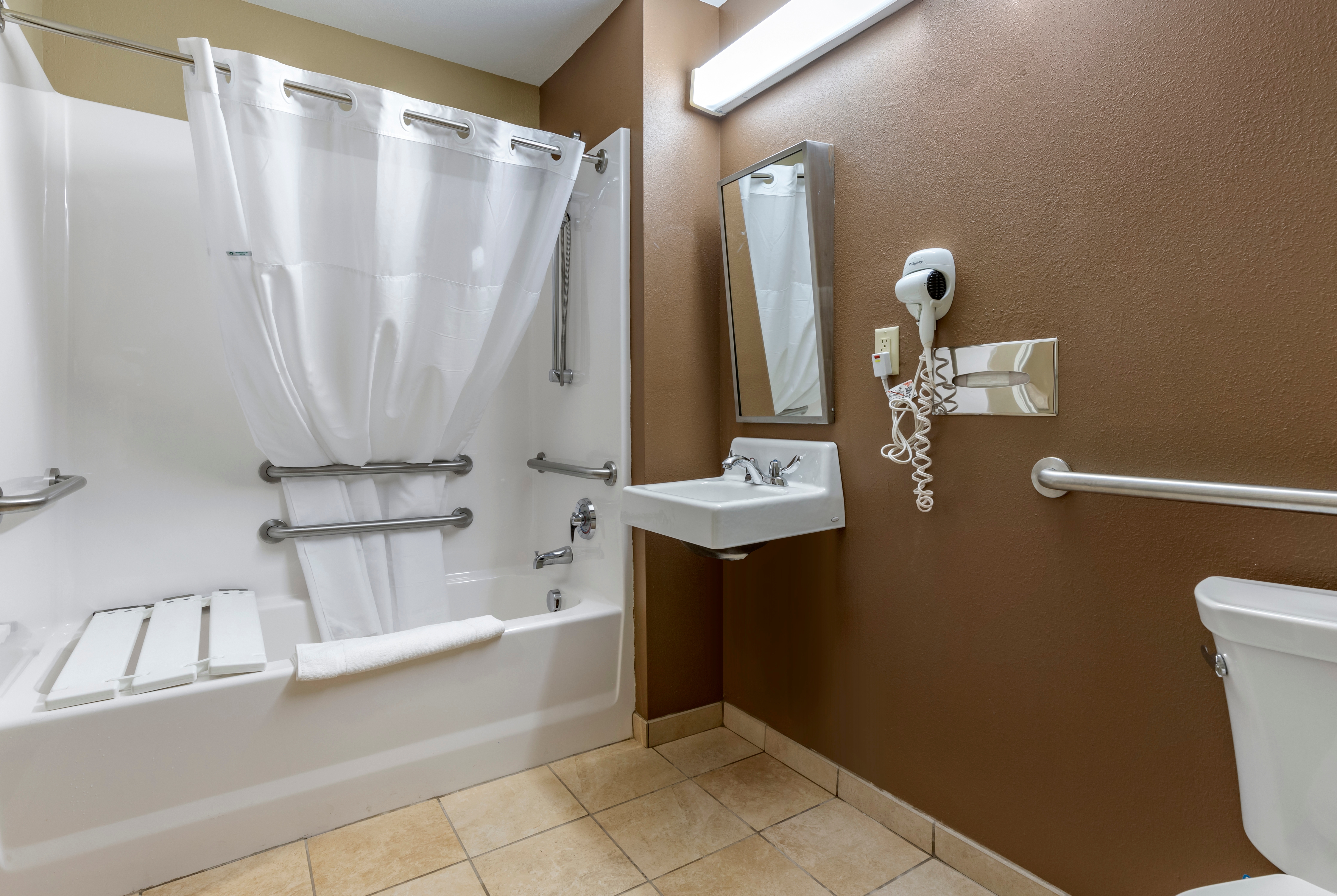 Guest room bath at the Microtel Inn & Suites by Wyndham Sylva Dillsboro Area in Sylva, North Carolina