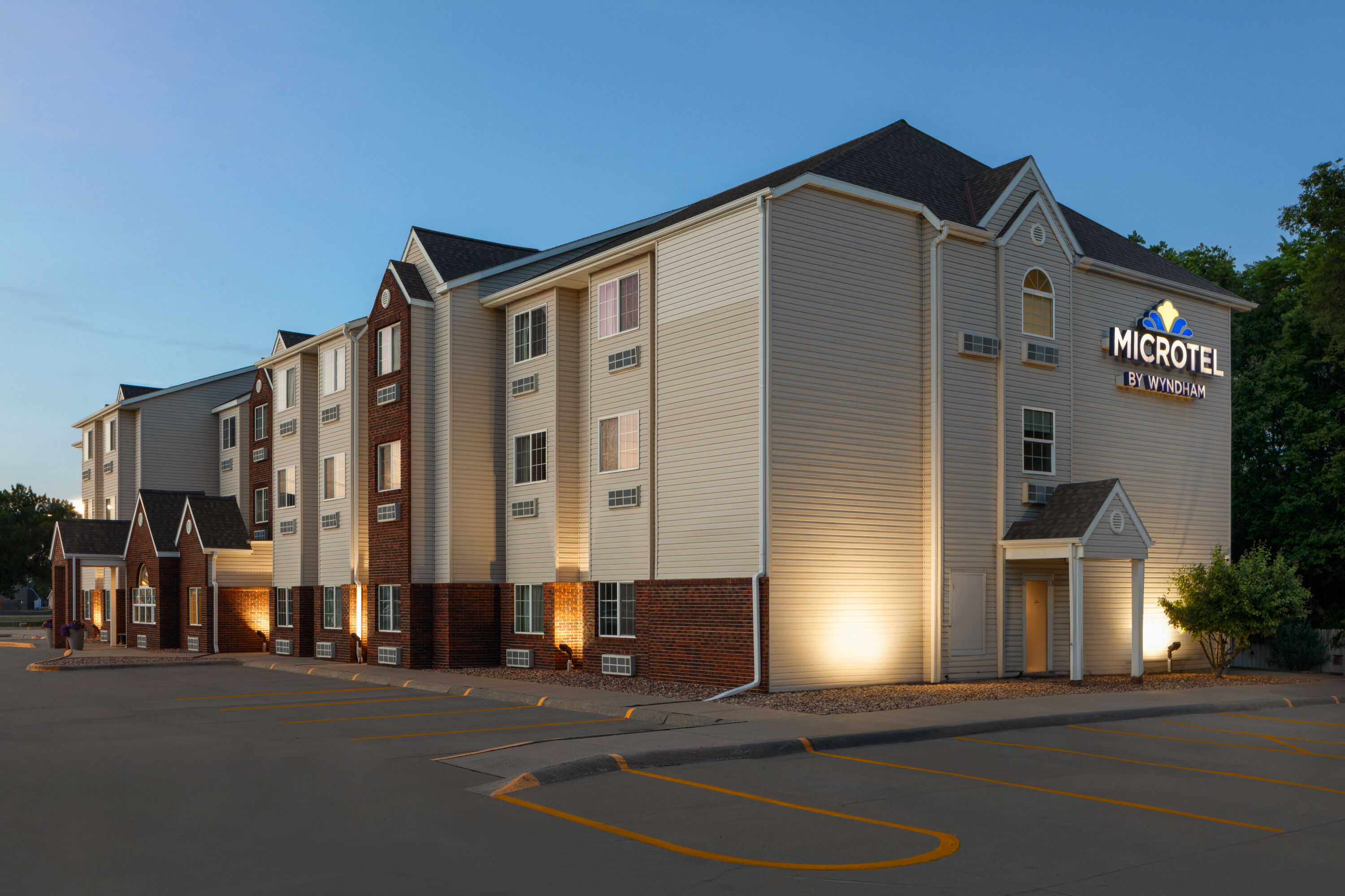 Exterior Dusk Image of Microtel Inn & Suites by Wyndham Kearney hotel in Kearney, Nebraska