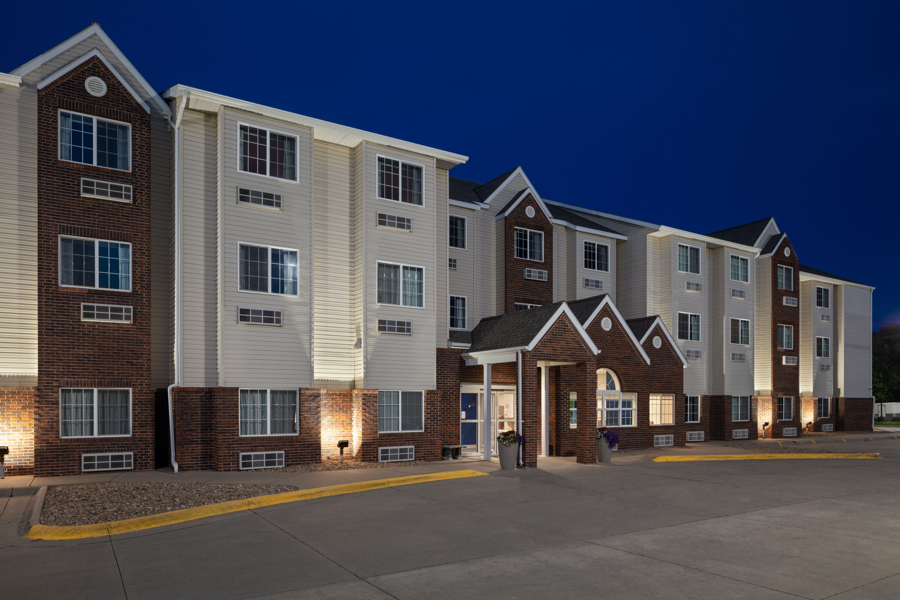 Exterior Dusk Image of Microtel Inn & Suites by Wyndham Kearney hotel in Kearney, Nebraska