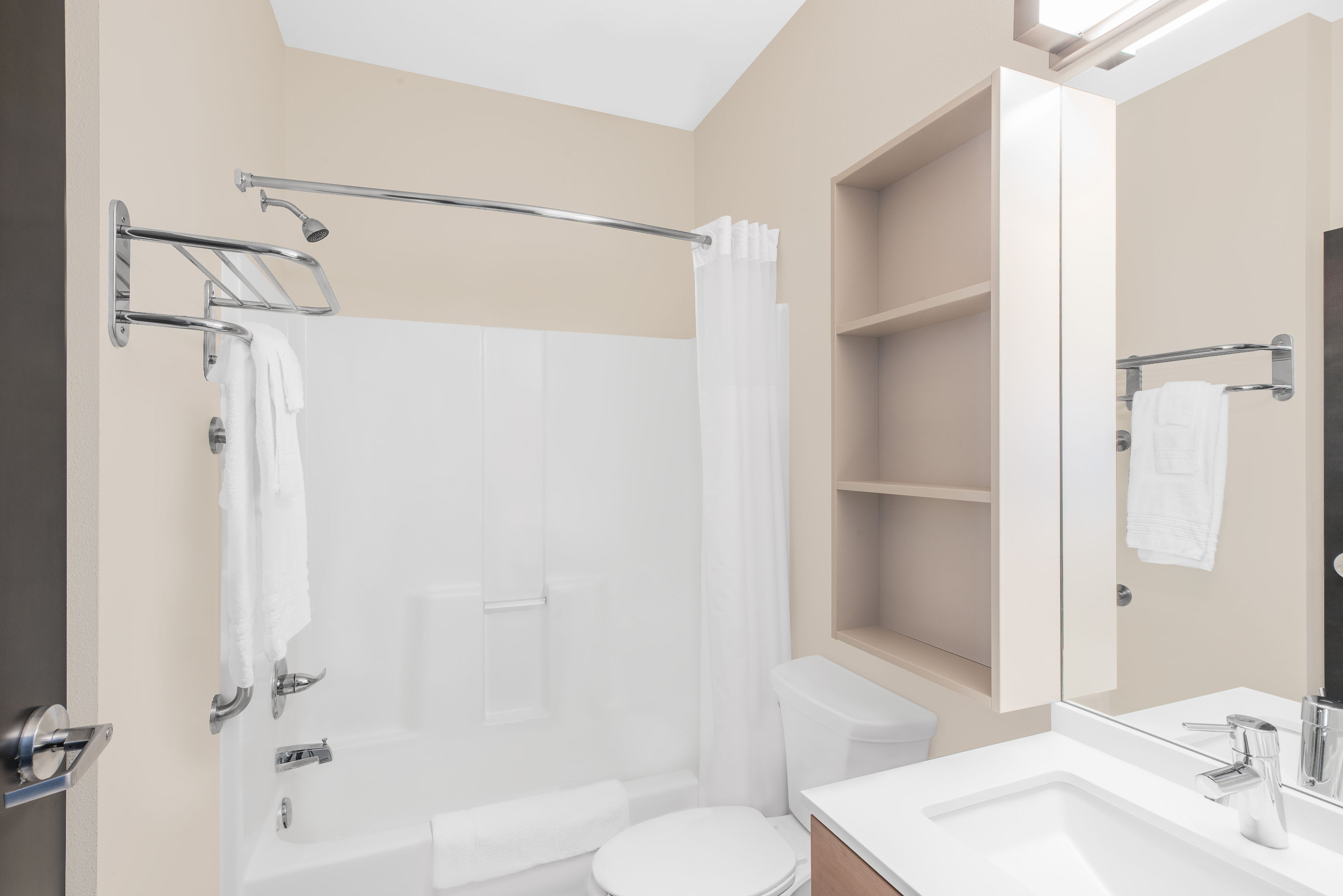 Guest room bath at the Microtel Inn & Suites by Wyndham Binghamton in Binghamton, New York