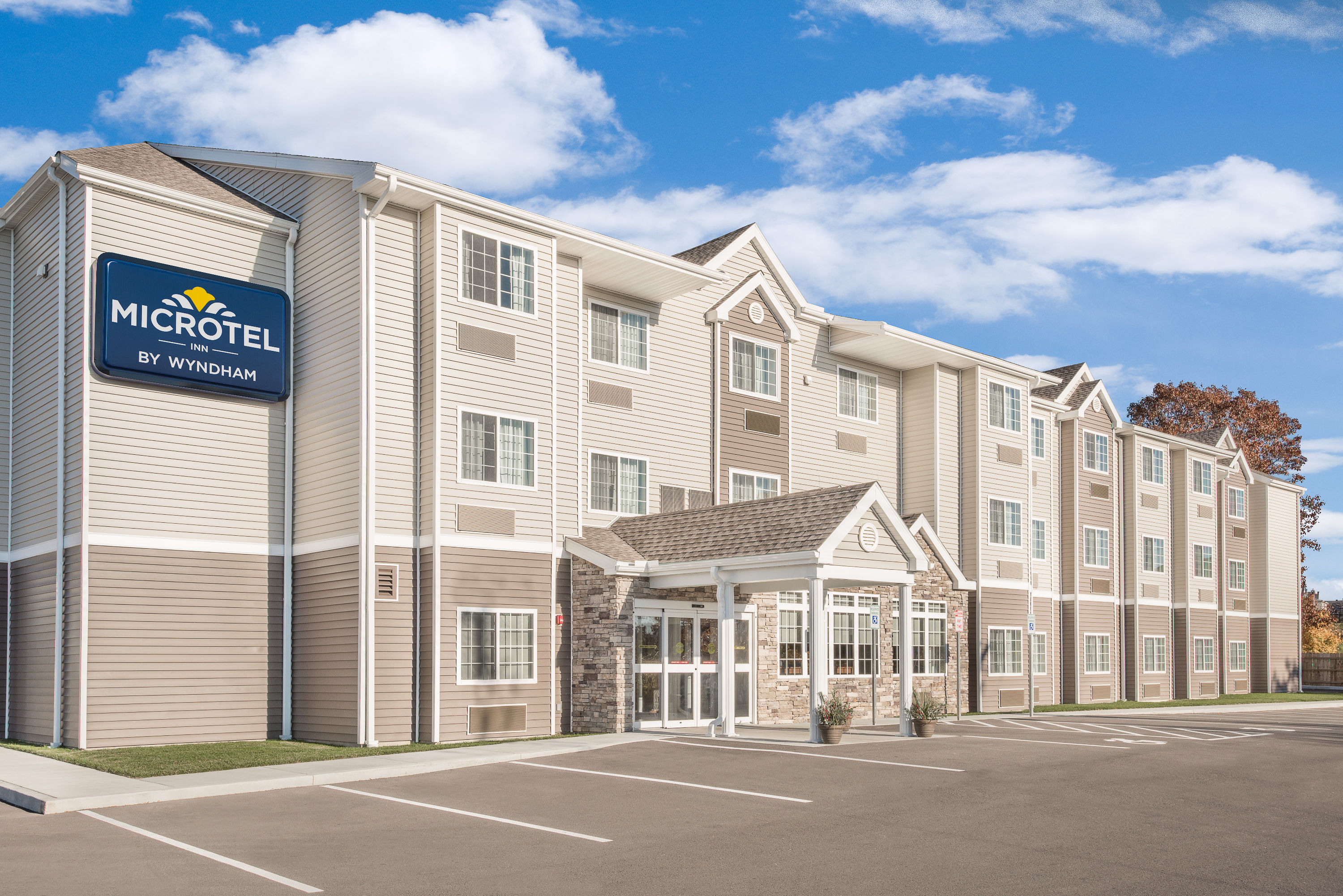 Exterior Day Image of Microtel Inn & Suites by Wyndham Binghamton hotel in Binghamton, New York