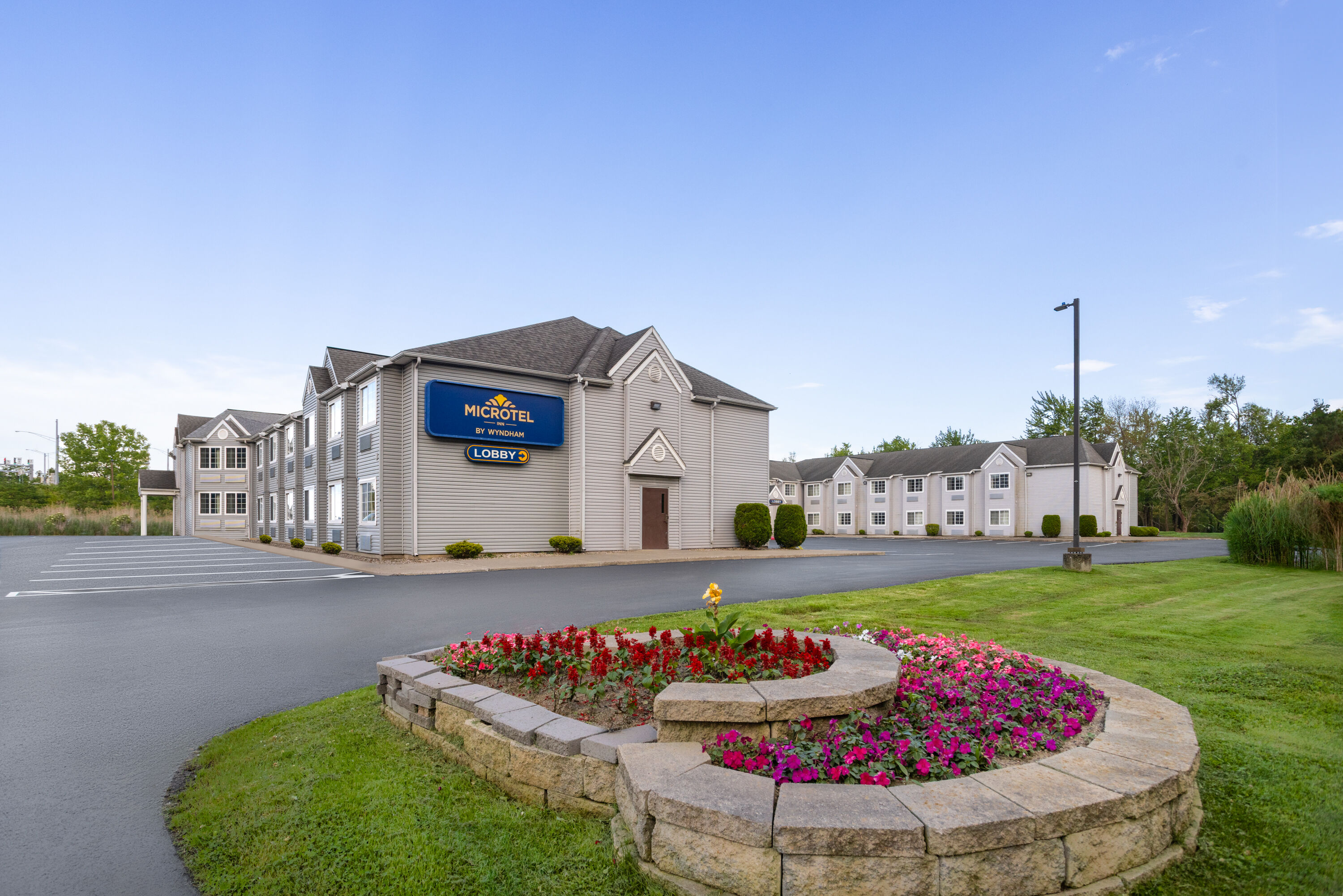 Exterior Day Image of Microtel Inn by Wyndham Albany Airport hotel in Latham, New York