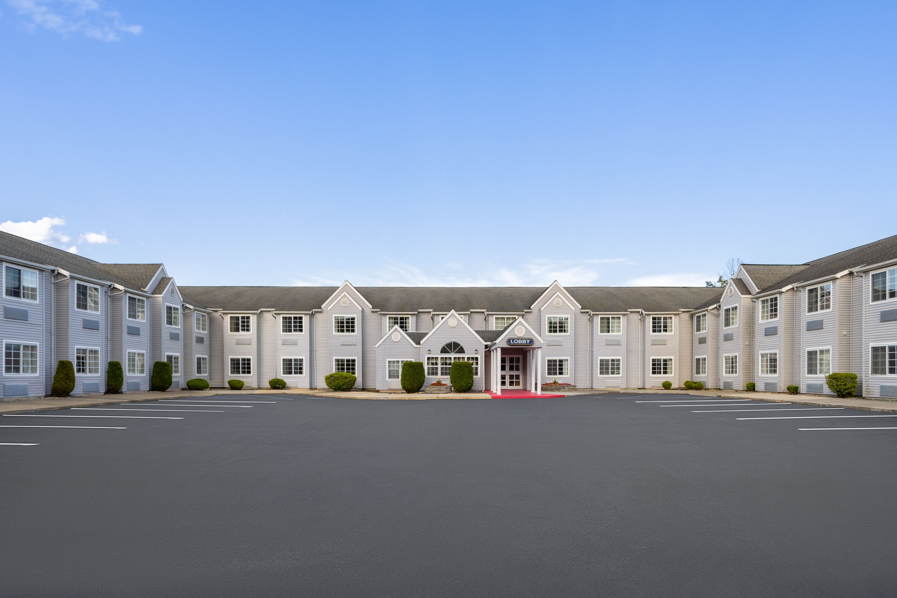 Exterior Day Image of Microtel Inn by Wyndham Albany Airport hotel in Latham, New York