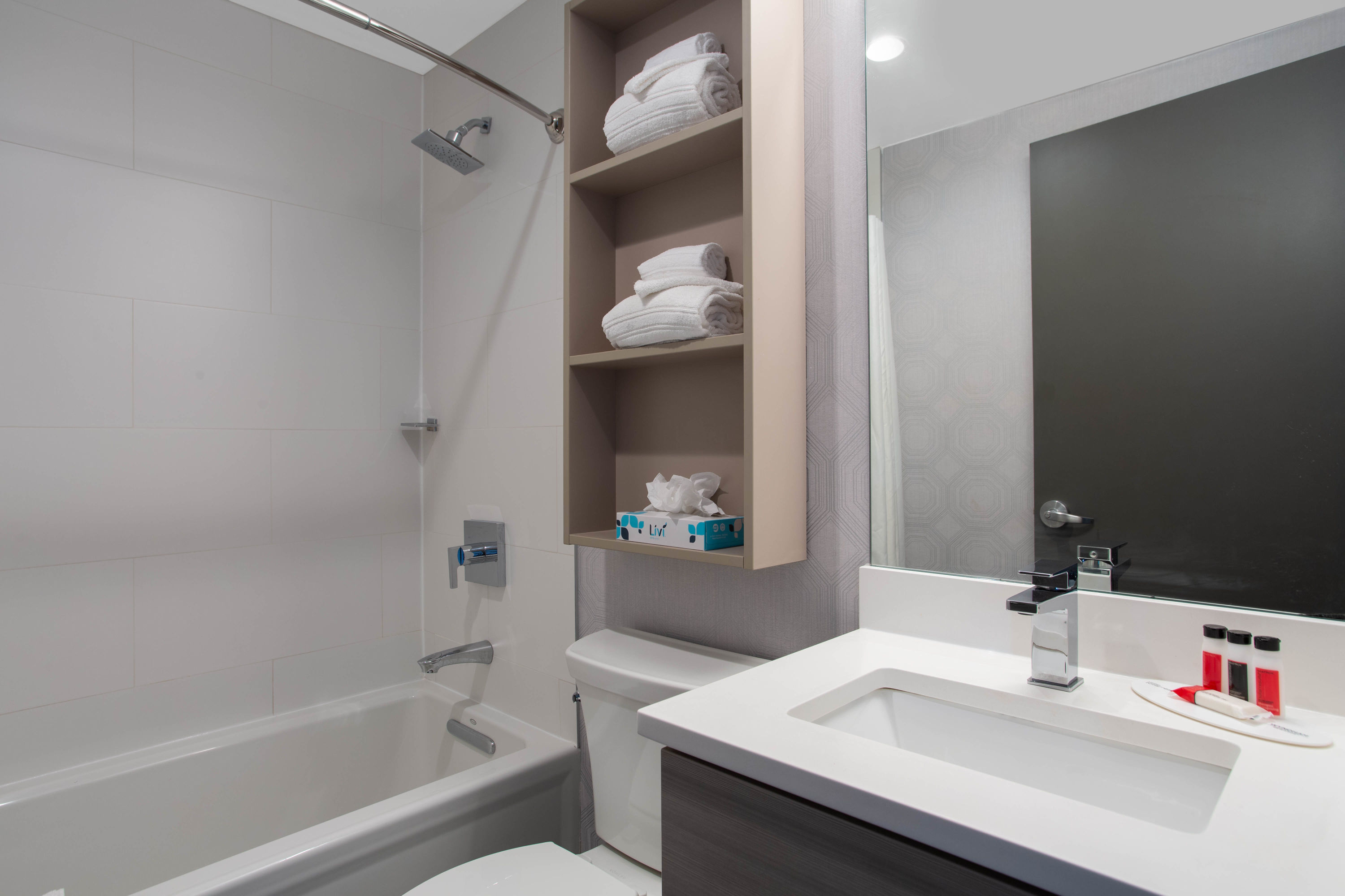 Guest room bath at the Microtel Inn by Wyndham Long Island City in Long Island City, New York