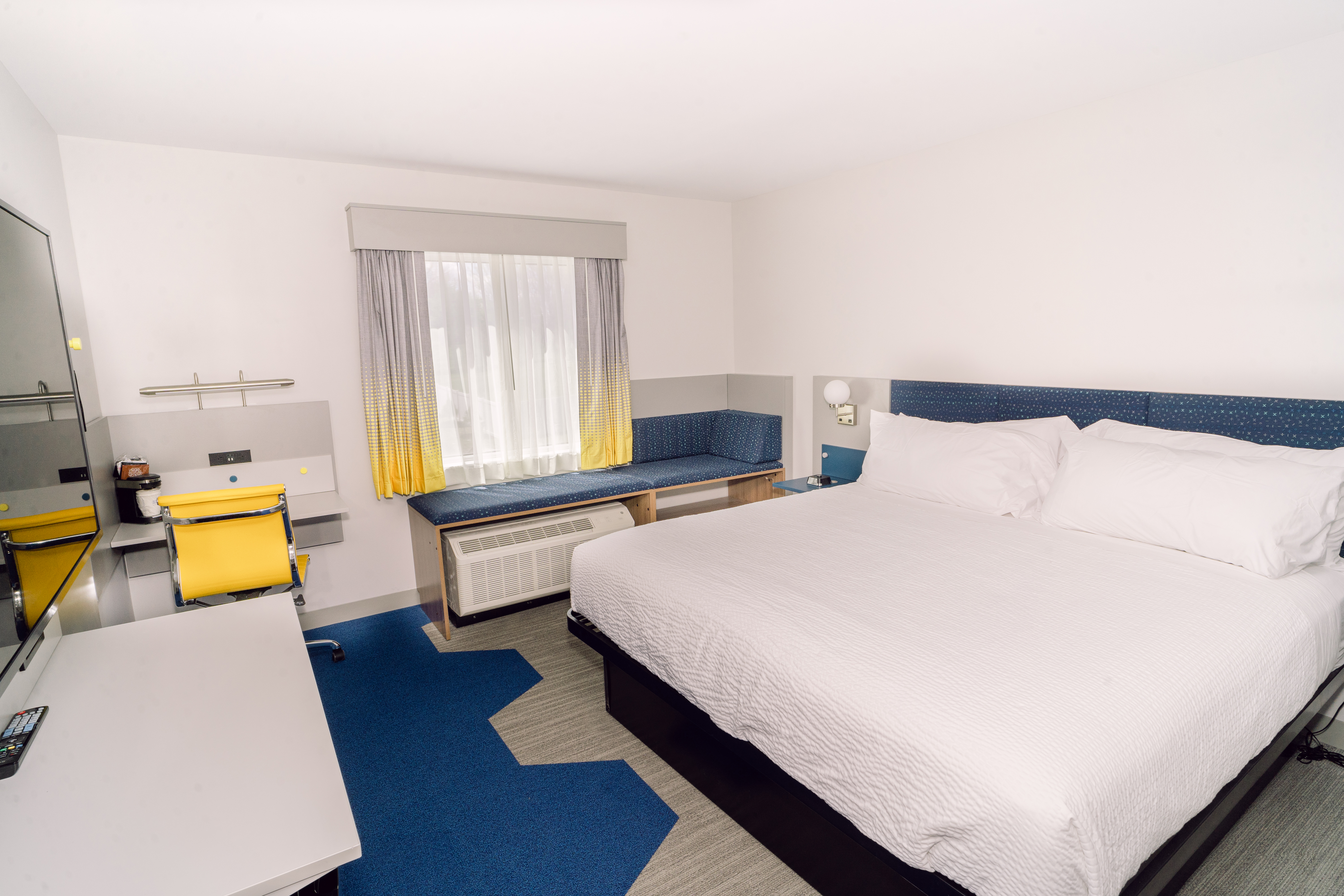 Guest room at the Microtel Inn & Suites by Wyndham Newark NY in Newark, New York