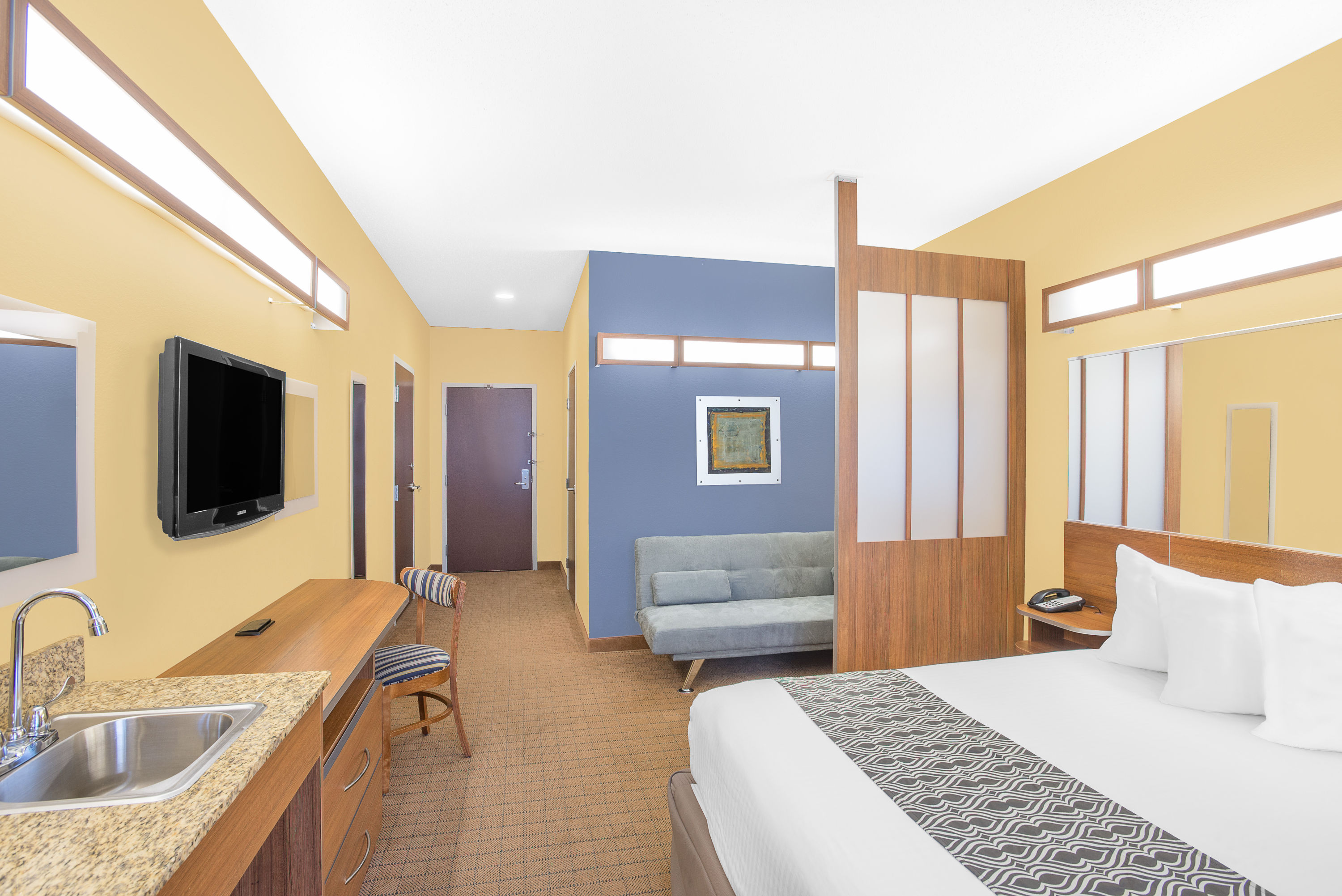 Guest room at the Microtel Inn & Suites by Wyndham Chili/Rochester Airport in Rochester, New York