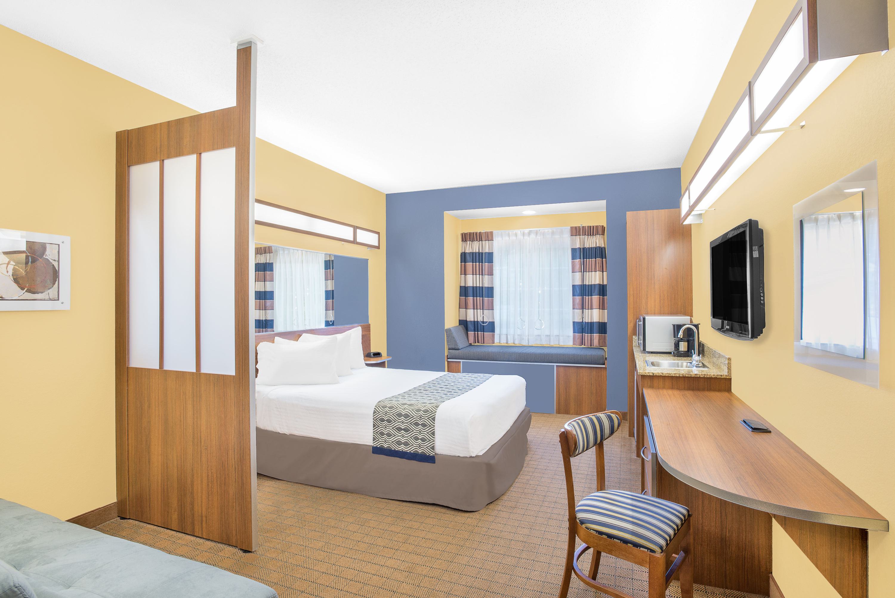 Guest room at the Microtel Inn & Suites by Wyndham Chili/Rochester Airport in Rochester, New York