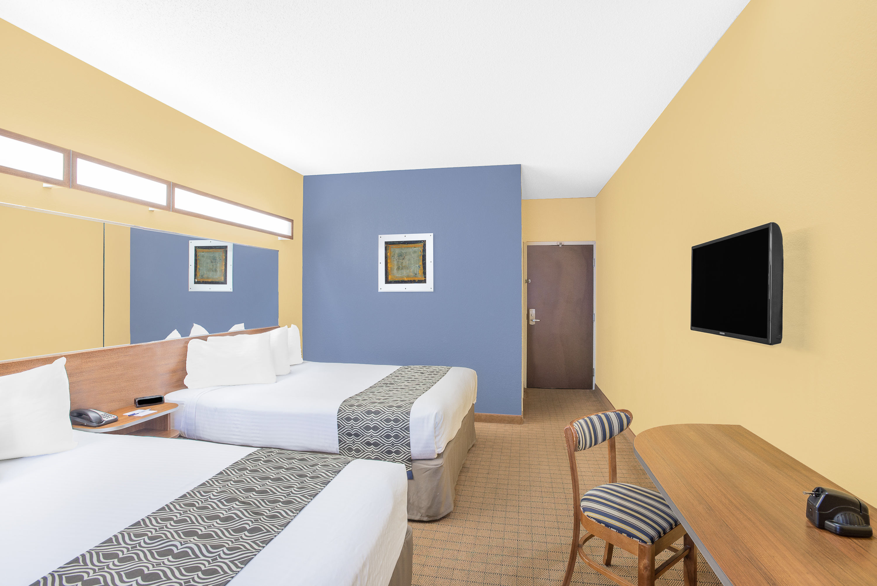 Guest room at the Microtel Inn & Suites by Wyndham Chili/Rochester Airport in Rochester, New York