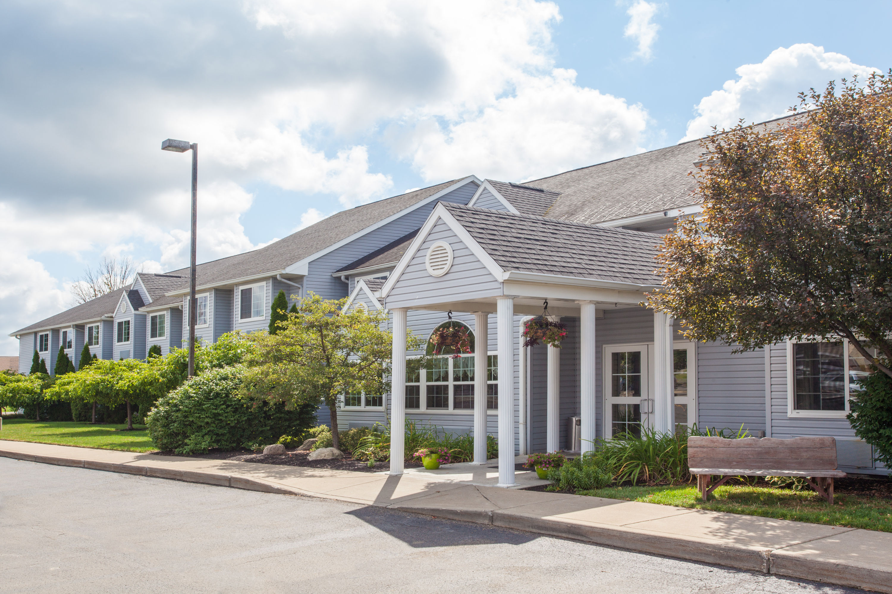 Exterior Day Image of Microtel Inn & Suites by Wyndham Springville hotel in Springville, New York