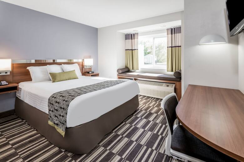 Guest room at the Microtel Inn & Suites by Wyndham Victor/Rochester in Victor, New York
