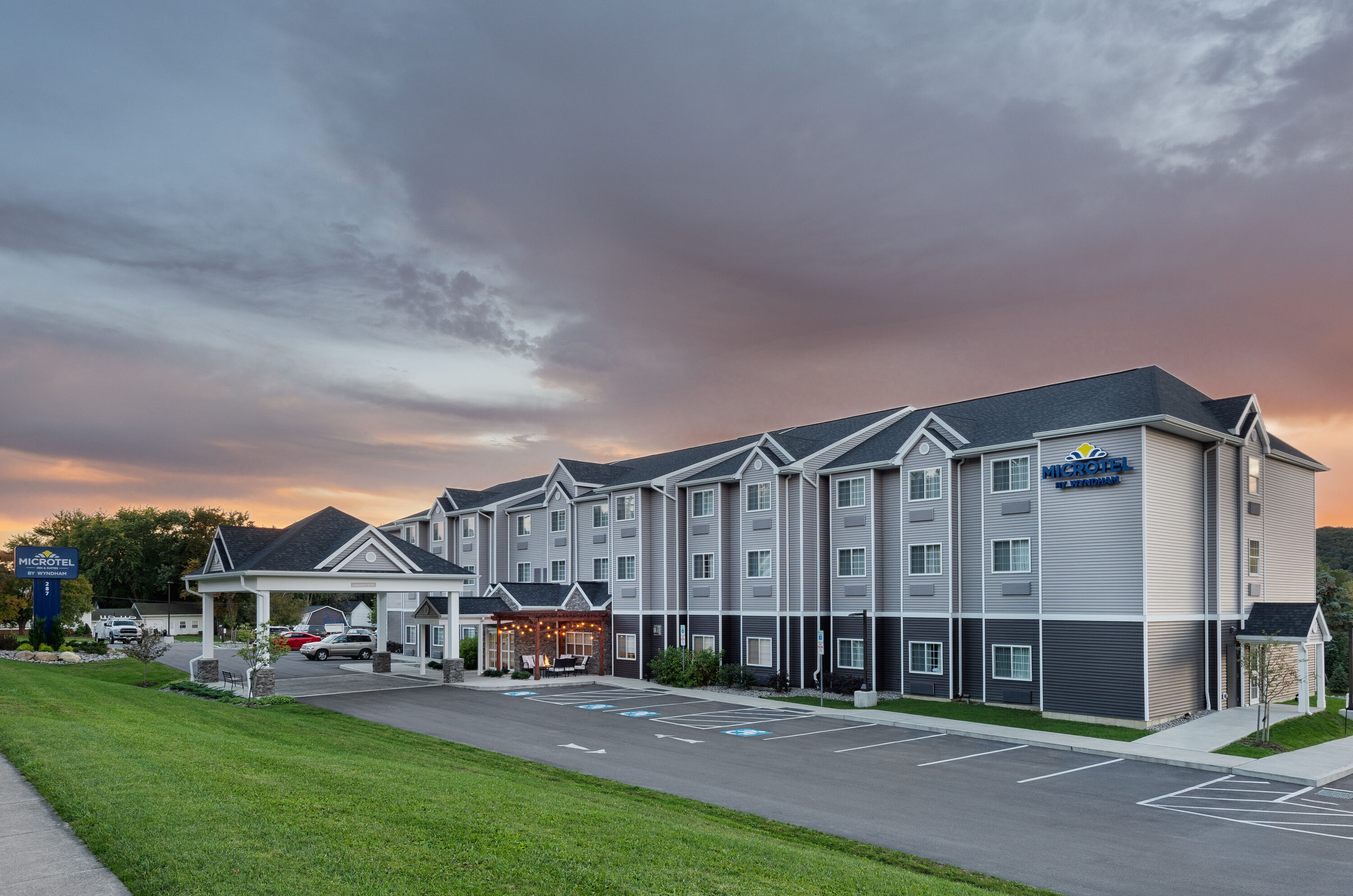 Exterior Dusk Image of Microtel Inn & Suites by Wyndham Warsaw hotel in Warsaw, New York