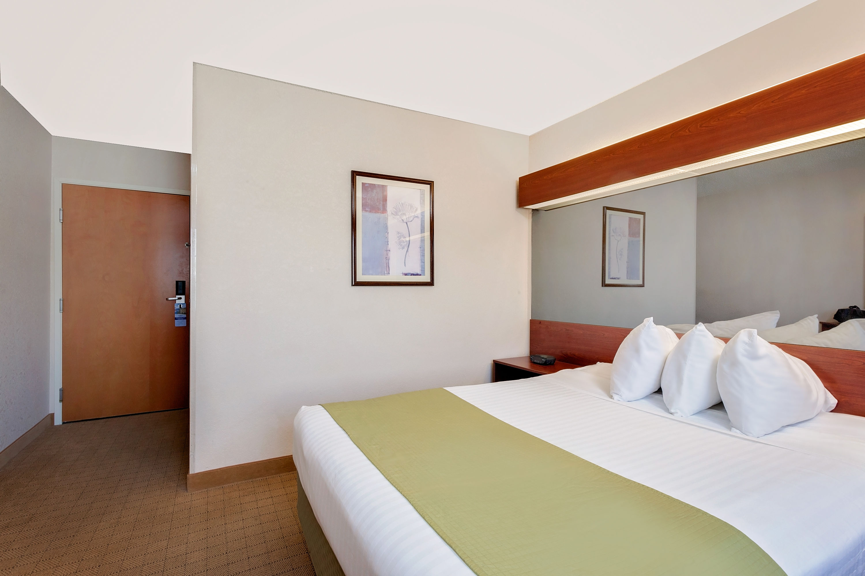 Guest room at the Microtel Inn & Suites by Wyndham Wellsville in Wellsville, New York