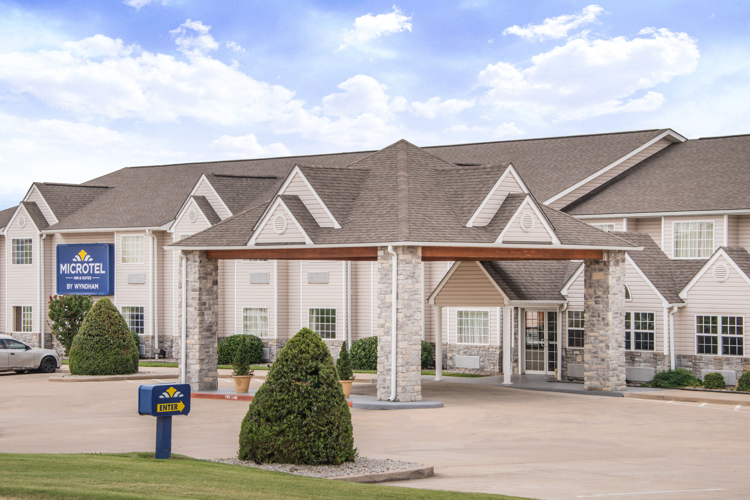 Exterior Day Image of Microtel Inn & Suites by Wyndham Miami hotel in Miami, Oklahoma
