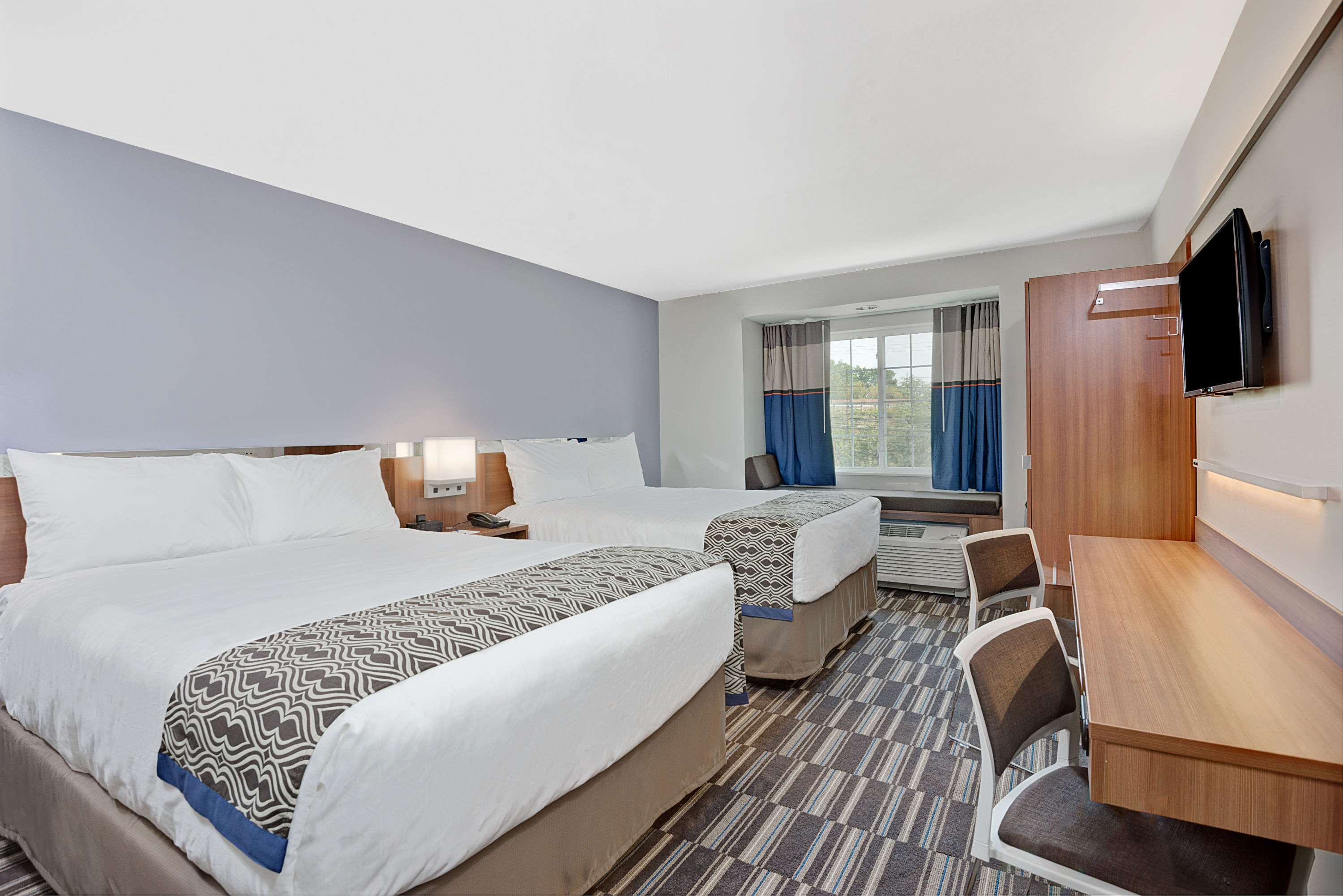 Guest room at the Microtel Inn & Suites by Wyndham Philadelphia Airport Ridley in Ridley Park, Pennsylvania