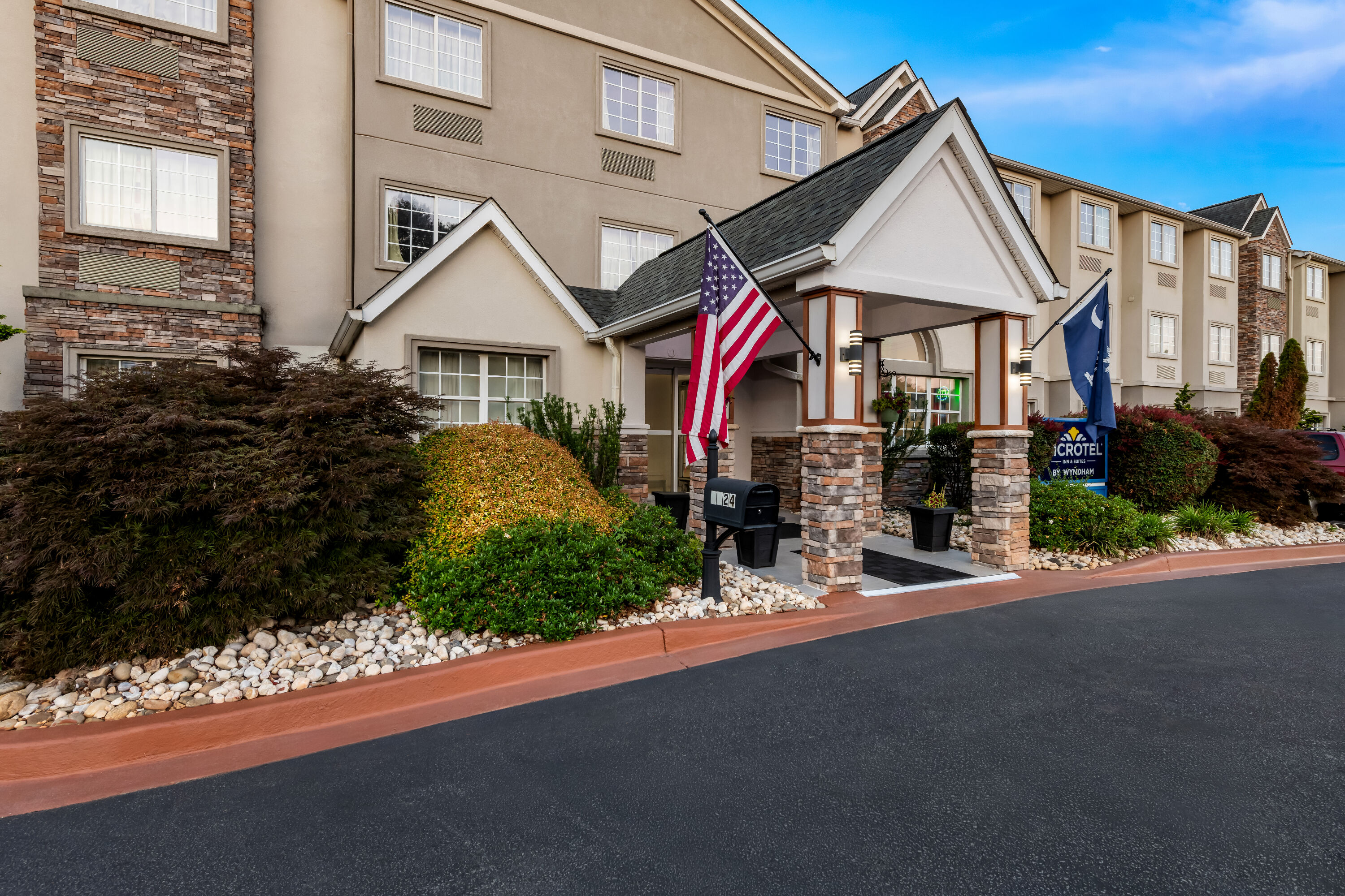 Exterior Day Image of Microtel Inn & Suites by Wyndham Greenville / Woodruff Rd hotel in Greenville, South Carolina