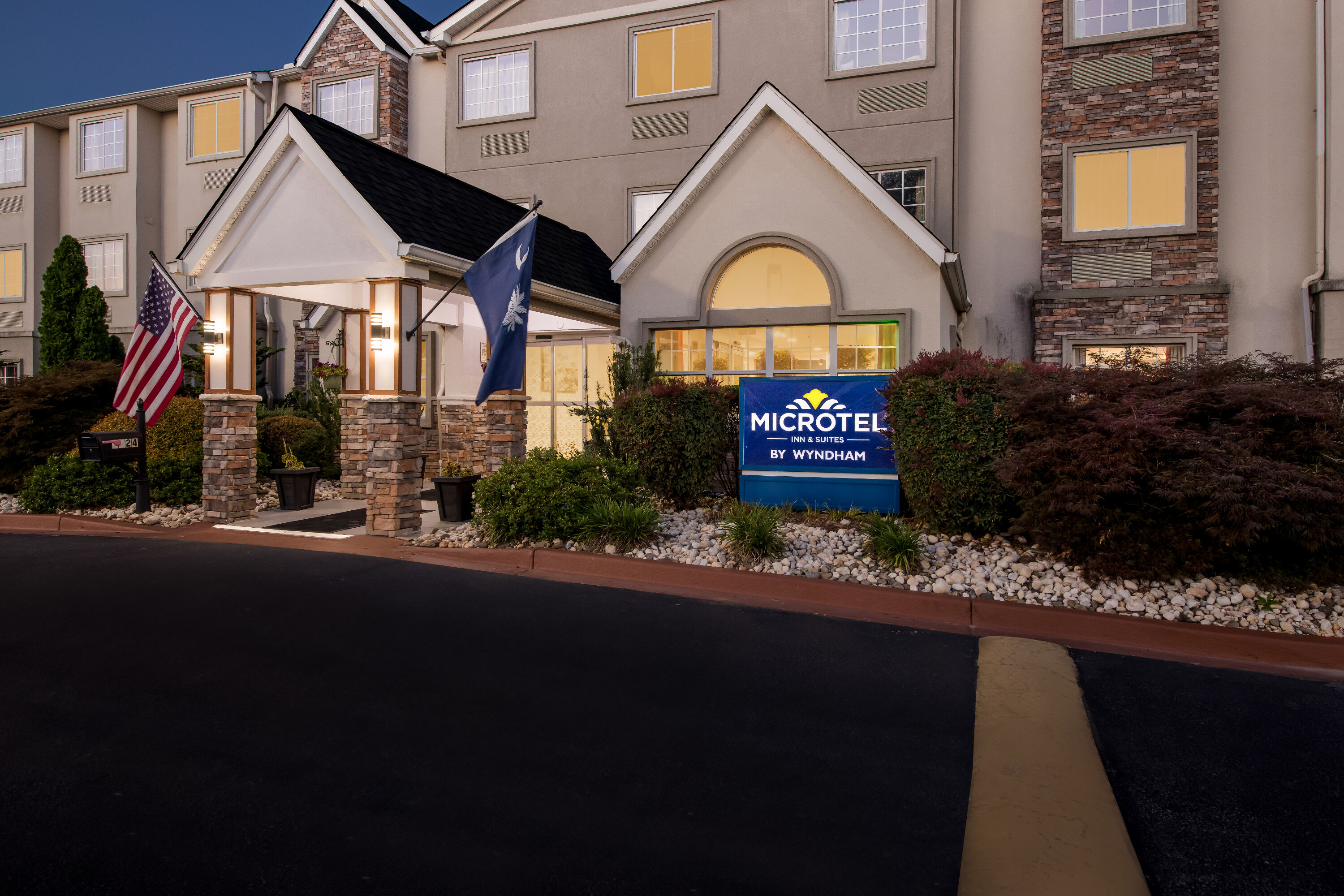 Exterior Night Image of Microtel Inn & Suites by Wyndham Greenville / Woodruff Rd hotel in Greenville, South Carolina
