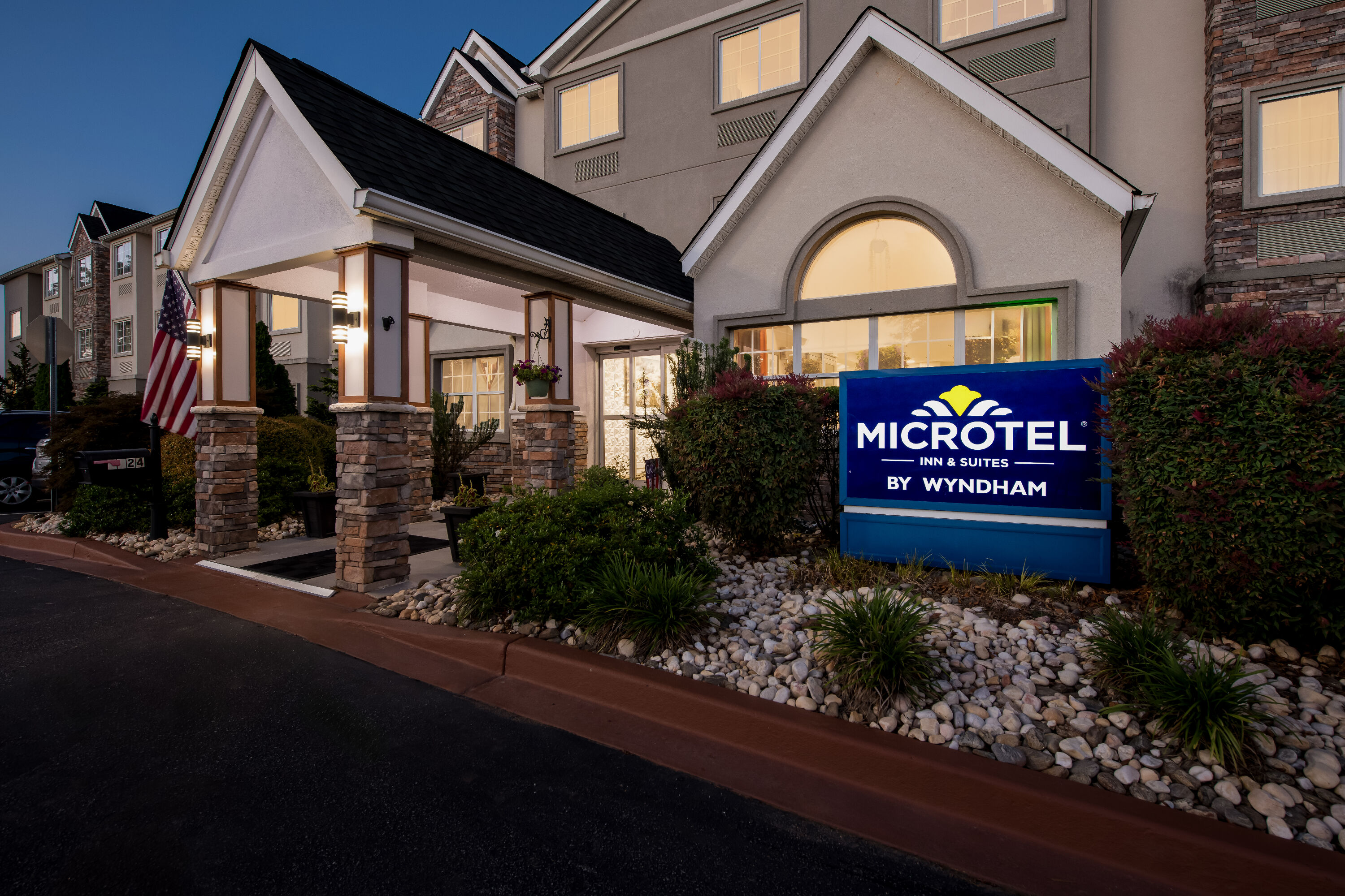 Exterior Night Image of Microtel Inn & Suites by Wyndham Greenville / Woodruff Rd hotel in Greenville, South Carolina