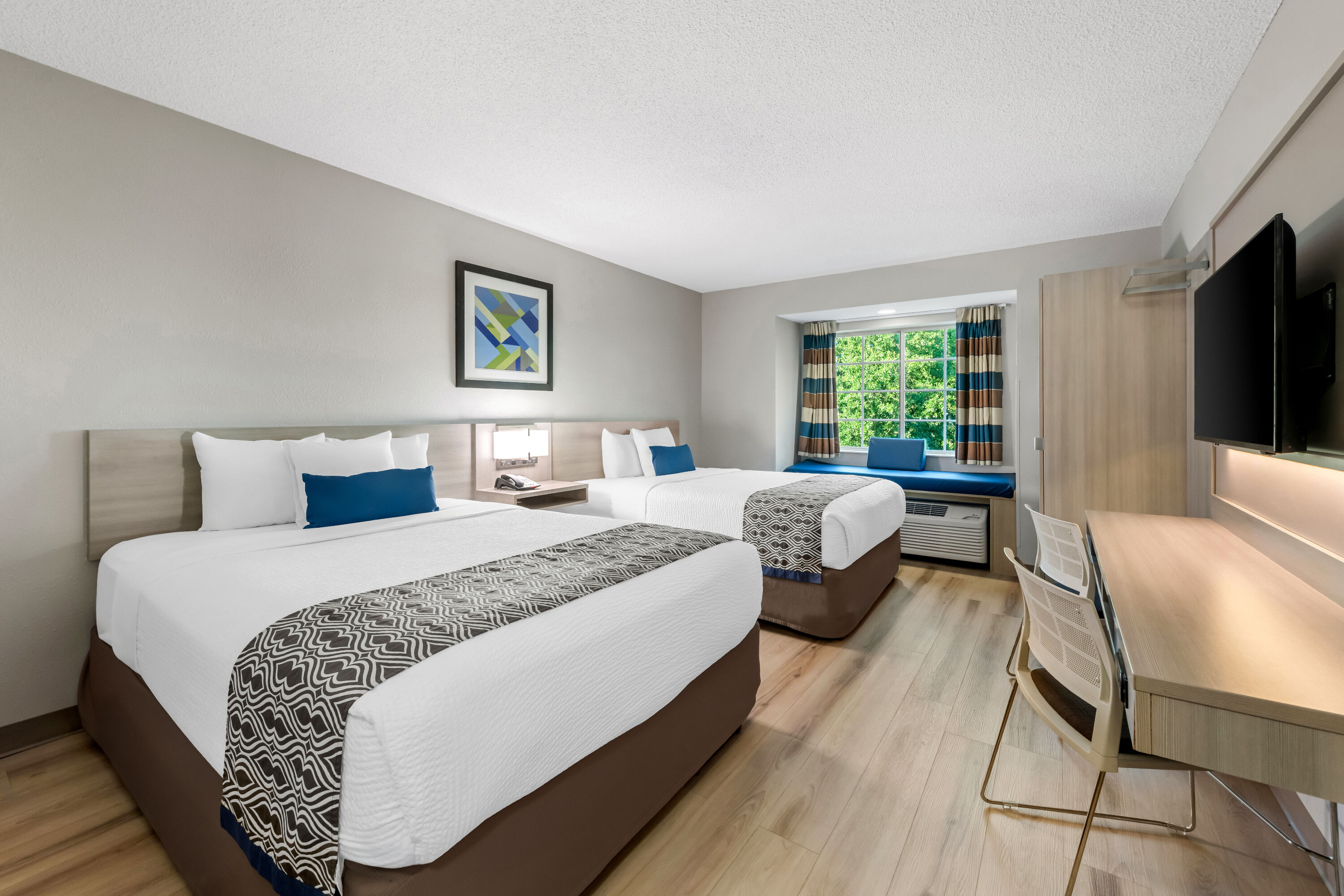 Double bed guest room at the Microtel Inn & Suites by Wyndham Greenville / Woodruff Rd in Greenville, South Carolina
