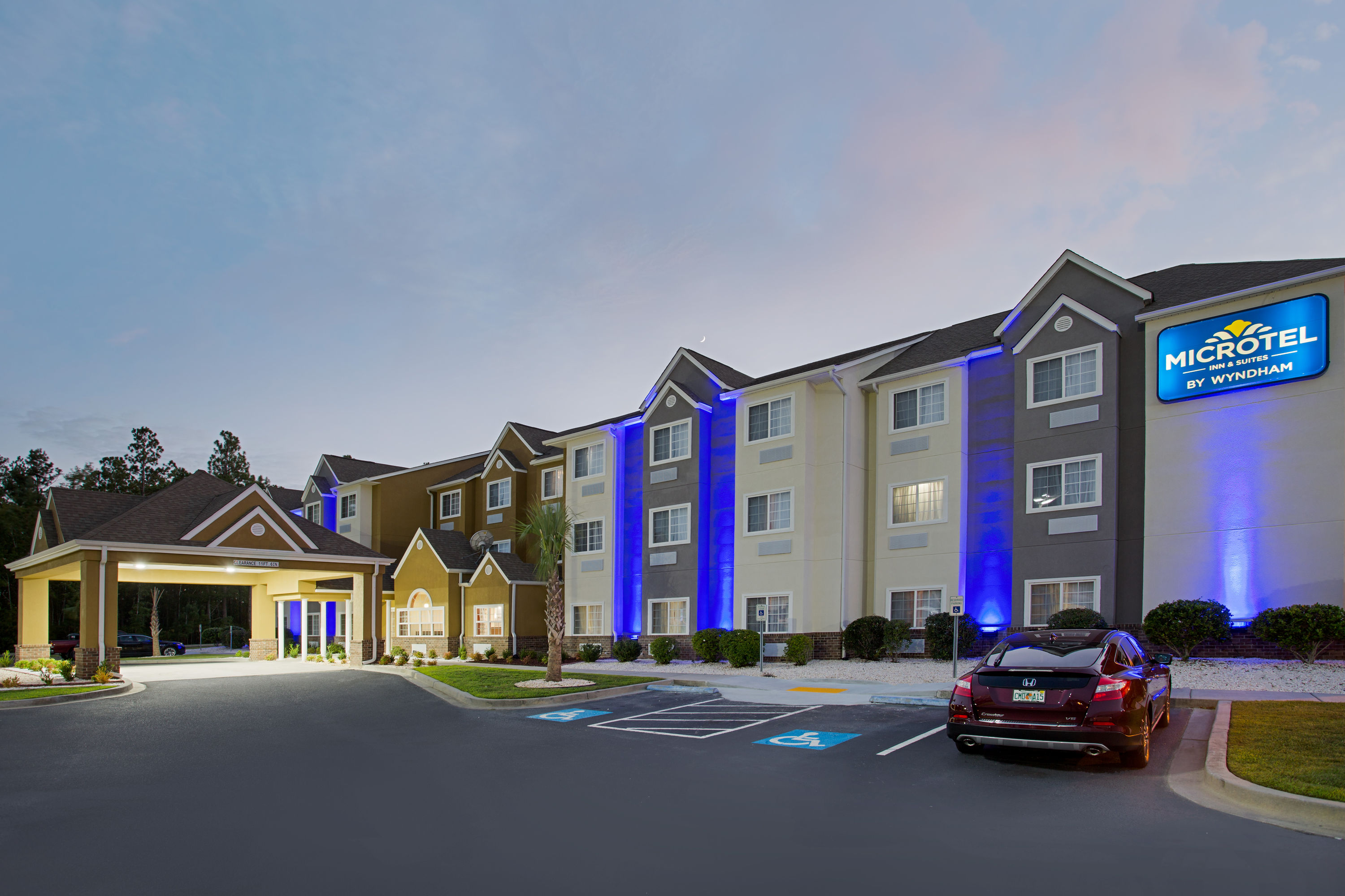 Exterior Night Image of Microtel Inn & Suites by Wyndham Walterboro hotel in Walterboro, South Carolina