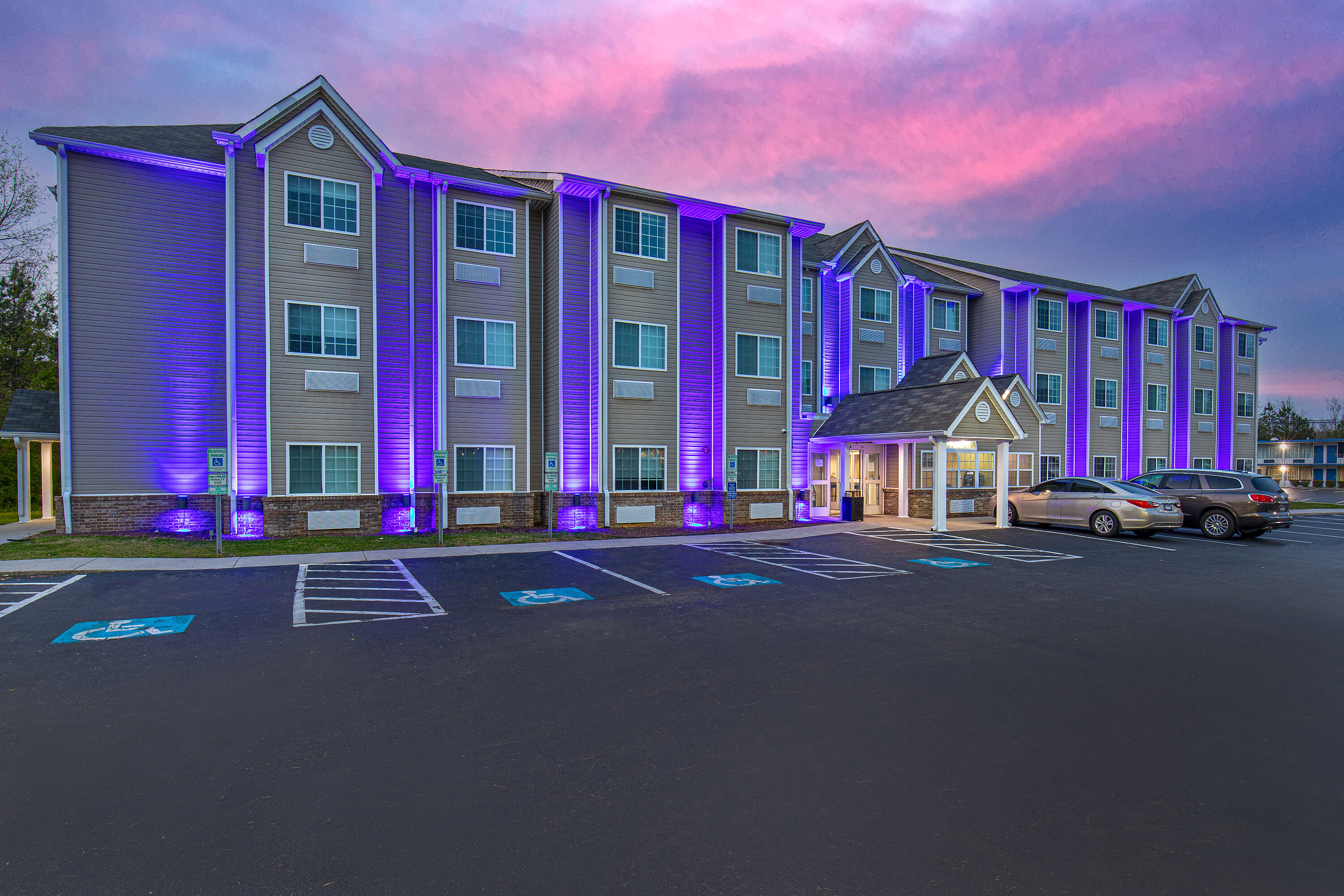 Exterior Dusk Image of Microtel Inn & Suites by Wyndham Manchester hotel in Manchester, Tennessee