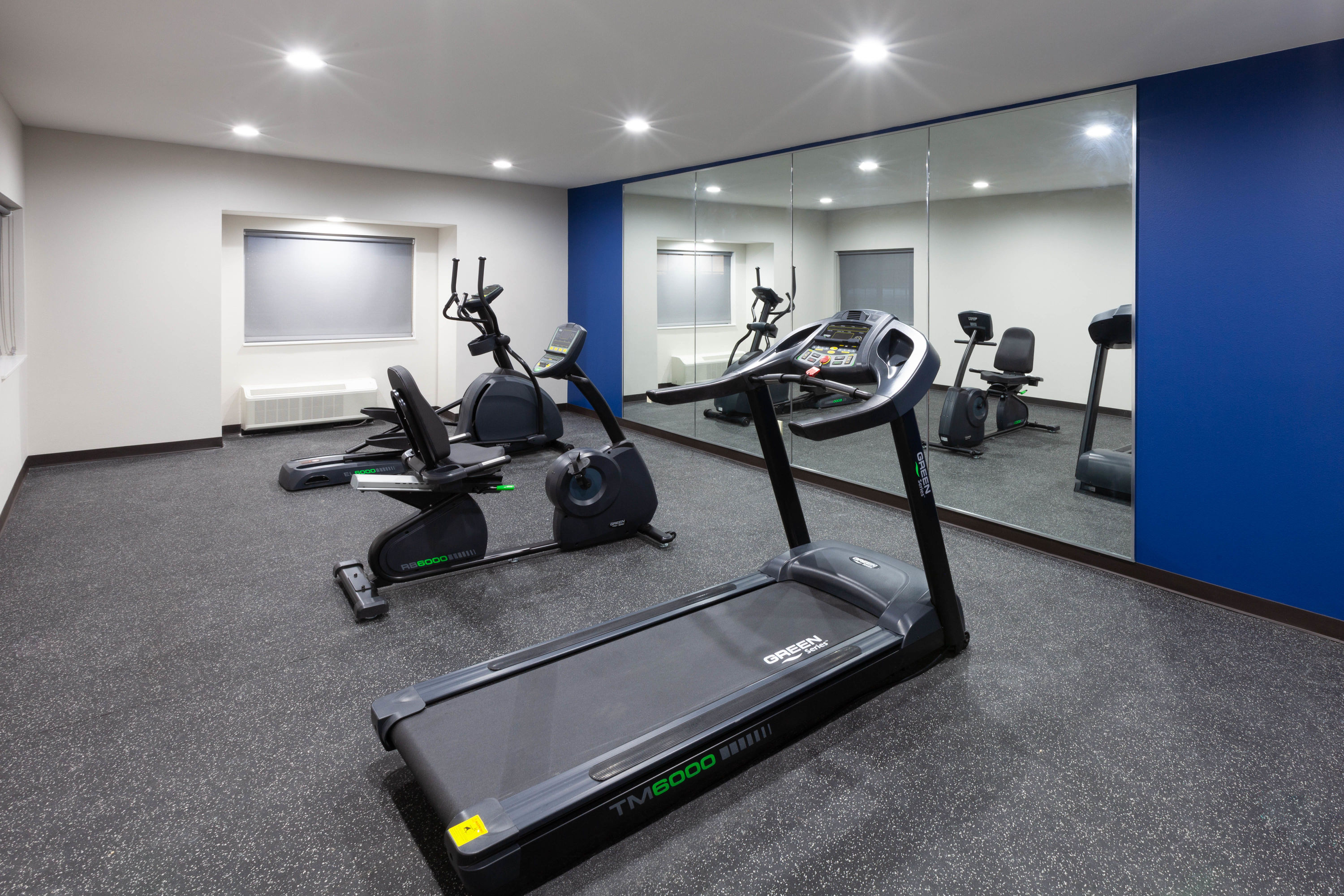 Fitness room at Microtel Inn & Suites by Wyndham College Station in College Station, Texas
