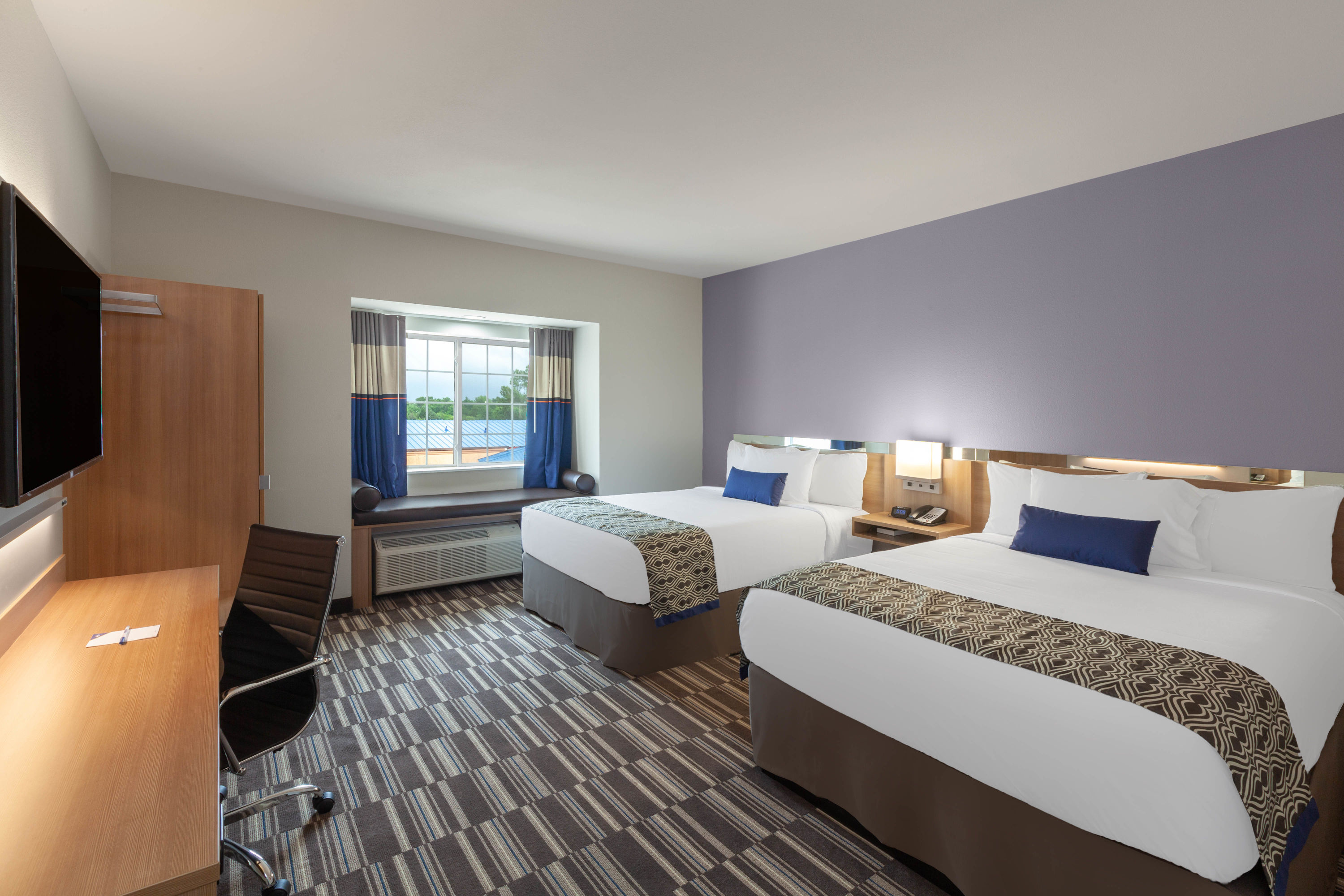 Guest room at the Microtel Inn & Suites by Wyndham College Station in College Station, Texas