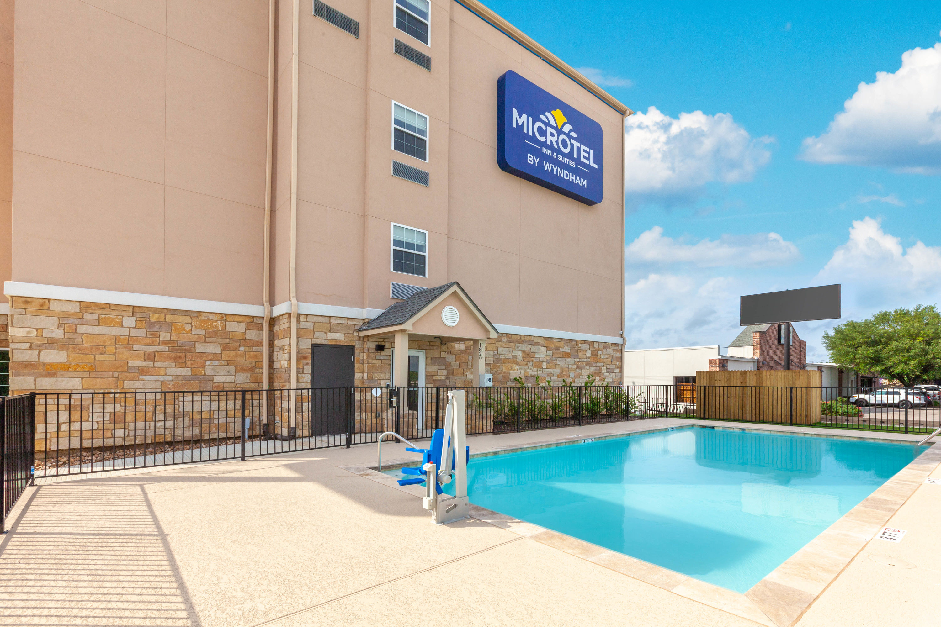 Pool at the Microtel Inn & Suites by Wyndham College Station in College Station, Texas