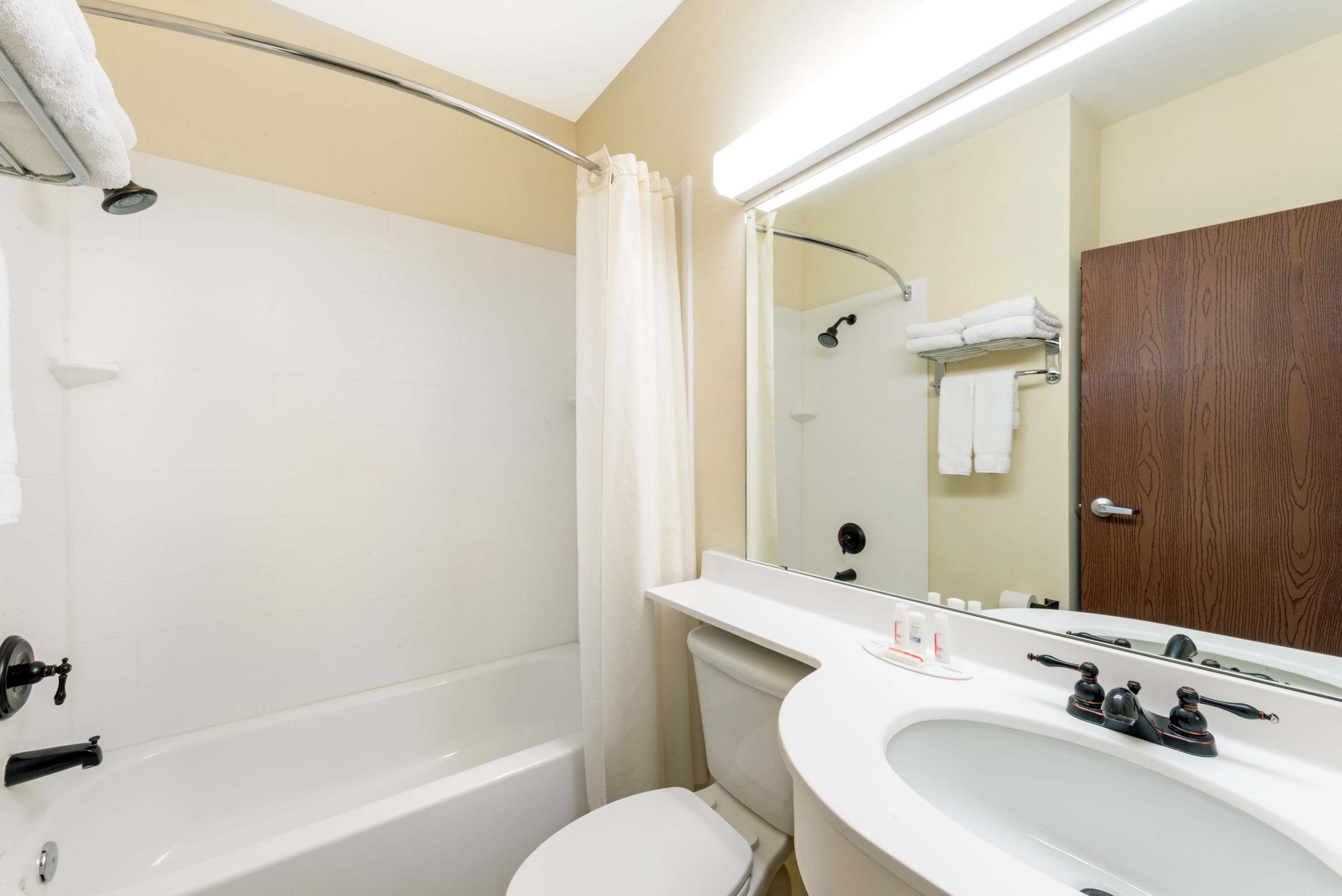 Guest room bath at the Microtel Inn & Suites by Wyndham Eagle Pass in Eagle Pass, Texas