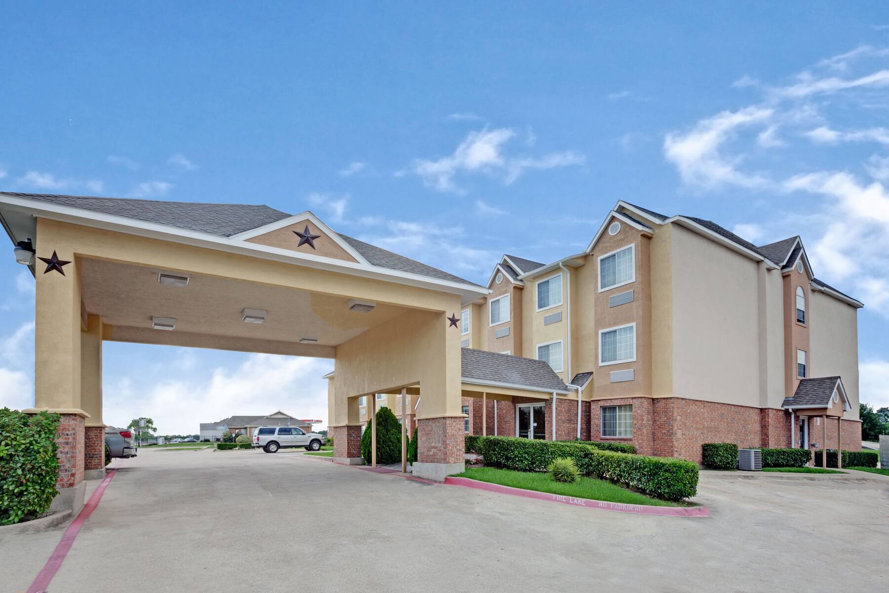 Exterior of Microtel Inn & Suites by Wyndham Mesquite/Dallas At I-30 hotel in Mesquite, Texas Exterior of Microtel Inn & Suites by Wyndham Mesquite/Dallas At I-30 hotel in Mesquite, Texas